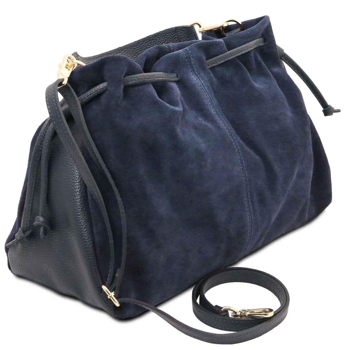 A dark blue suede and leather shoulder bag with gold-tone hardware, featuring a drawstring top closure and an adjustable detachable shoulder strap, shown on a white background.