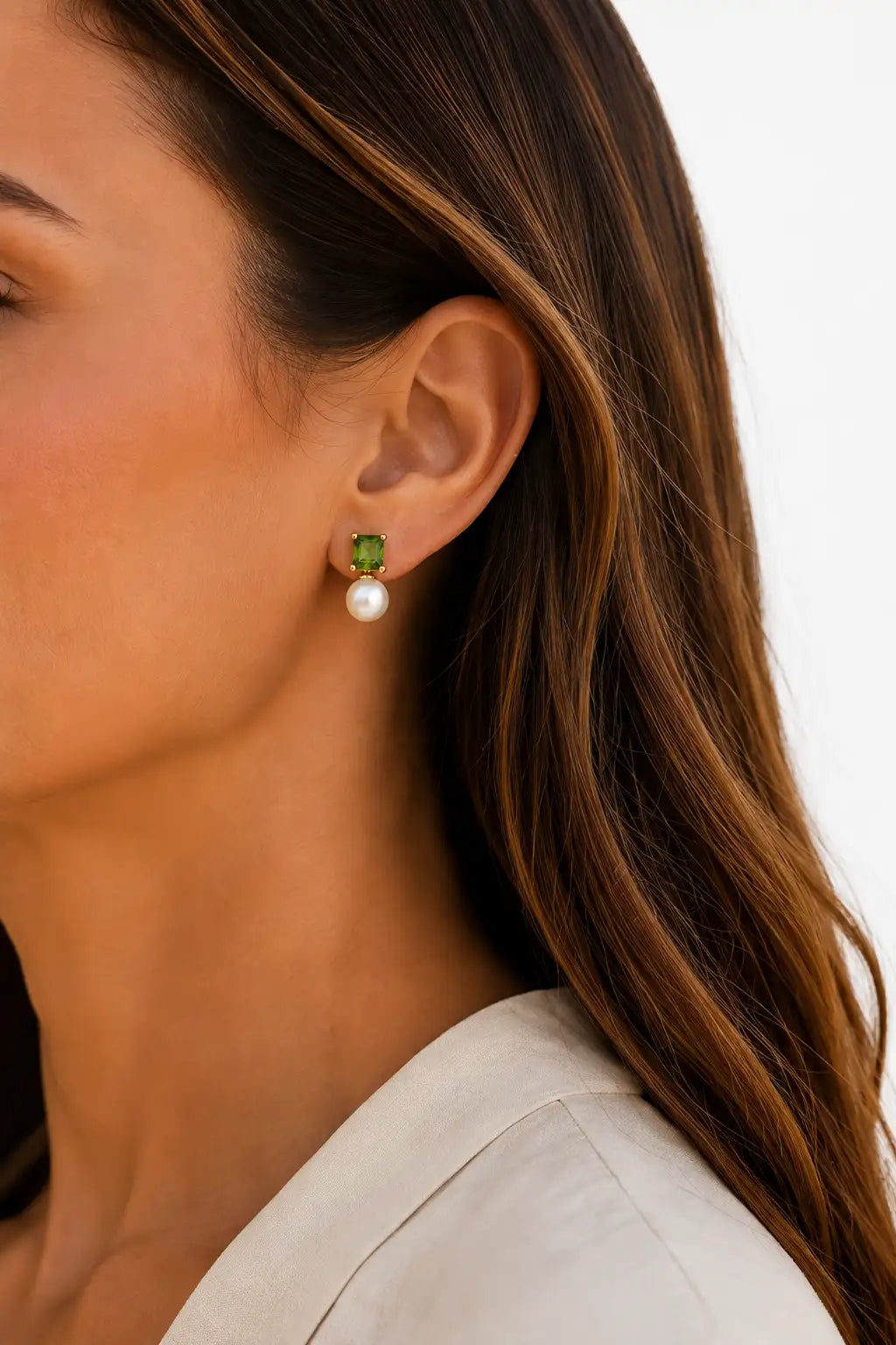 Aaliyah Stud Earrings Pearl & Green Tourmaline on a women's left ear