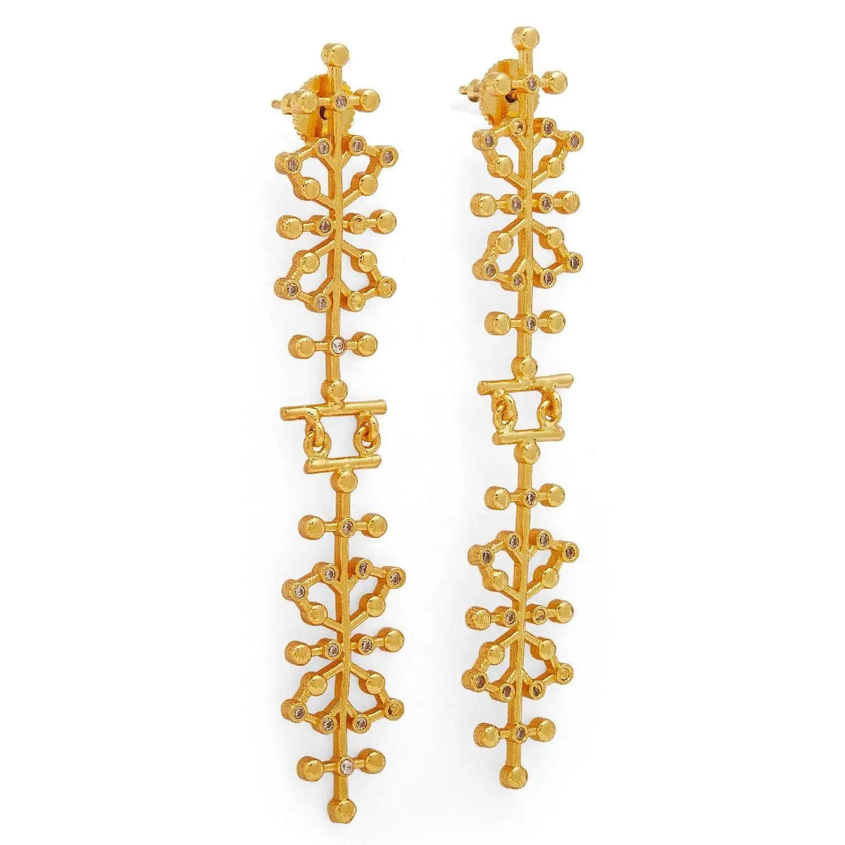 A pair of gold drop earrings with an intricate, branching geometric design set with small clear stones, shown against a plain white background.