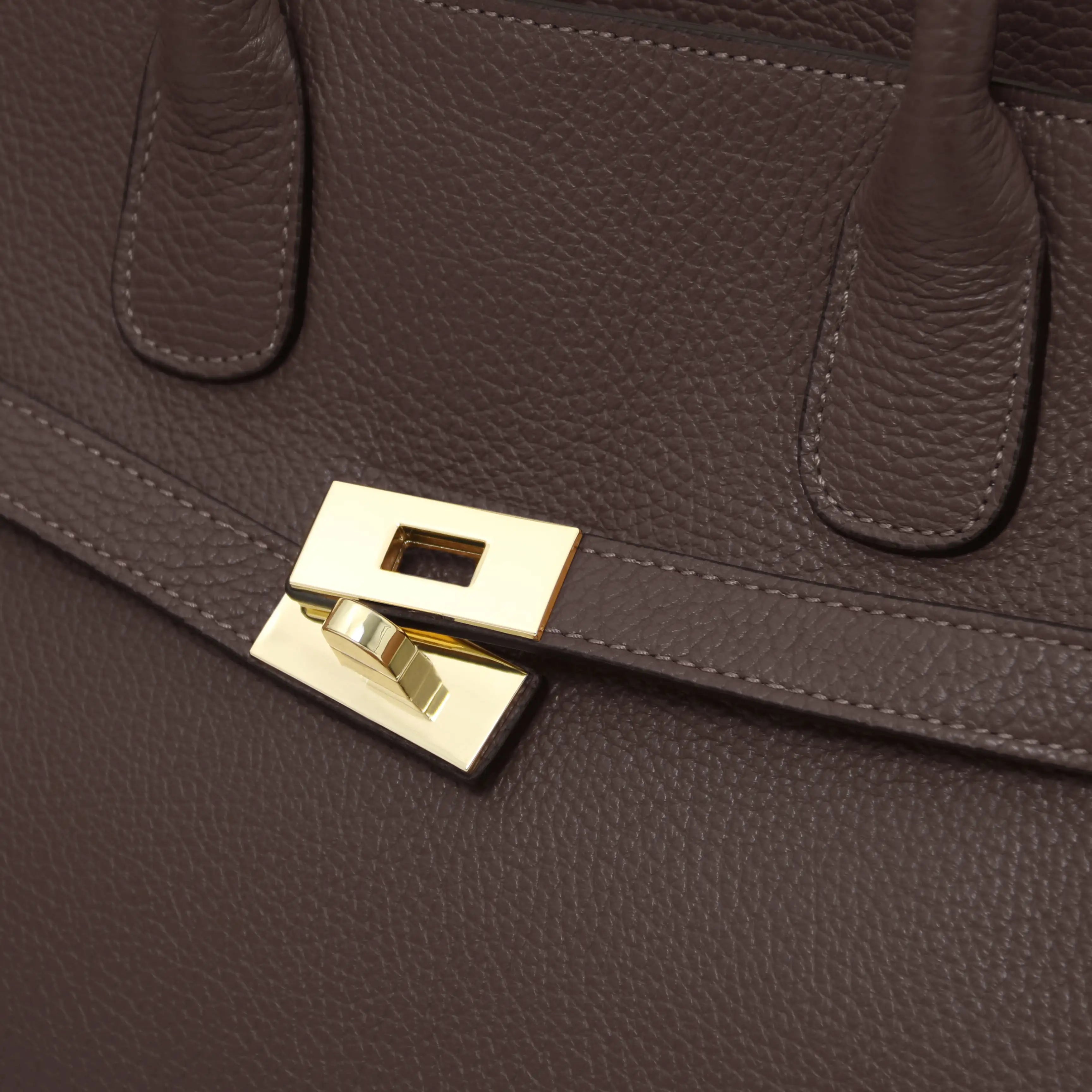 Close up gold Lock View Origami Leather Tote in Chocolate