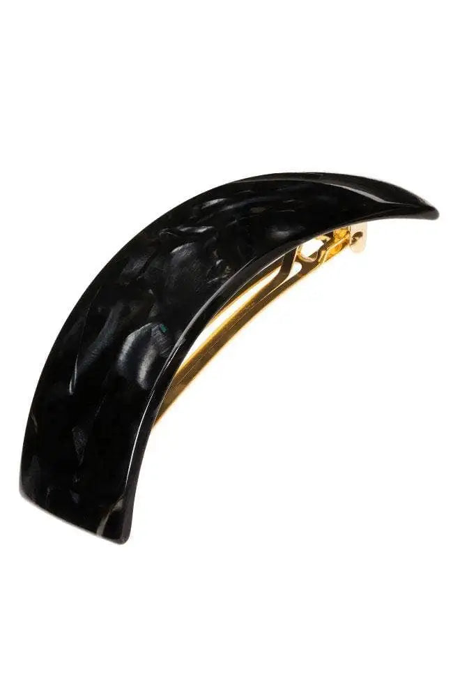 Black hair clip with gold accent on a white background