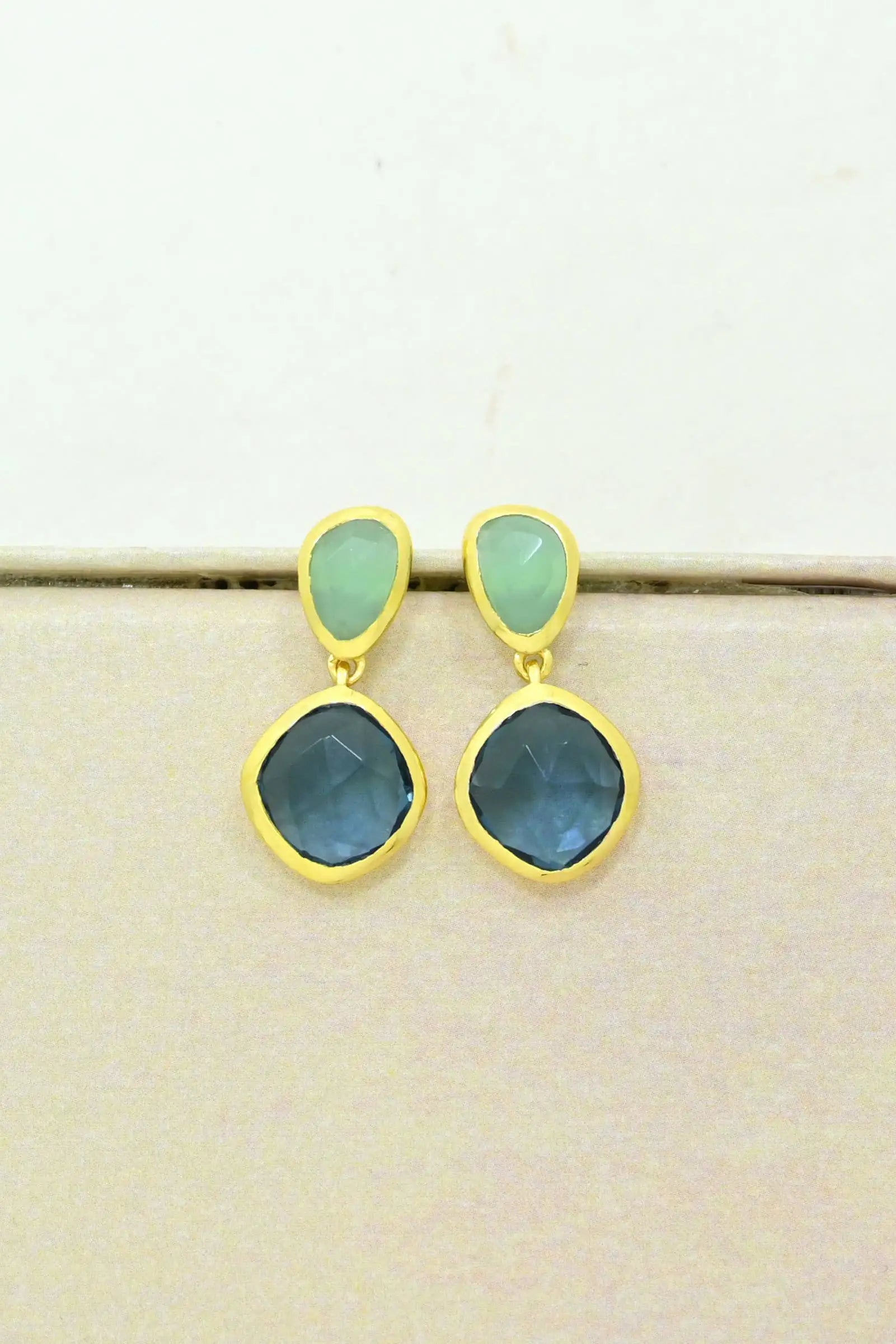 Front view Daleyza Drop Earrings with Blue Iolite & Aqua Chalcedony on a natural background.
