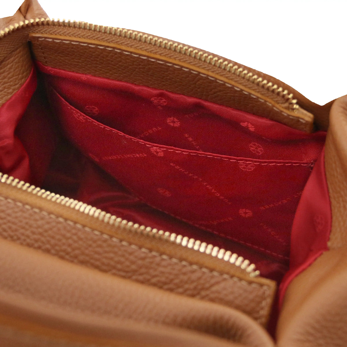 Interior open pocket view Nora Soft Italian Leather Shoulder Bag in cognac with red lining