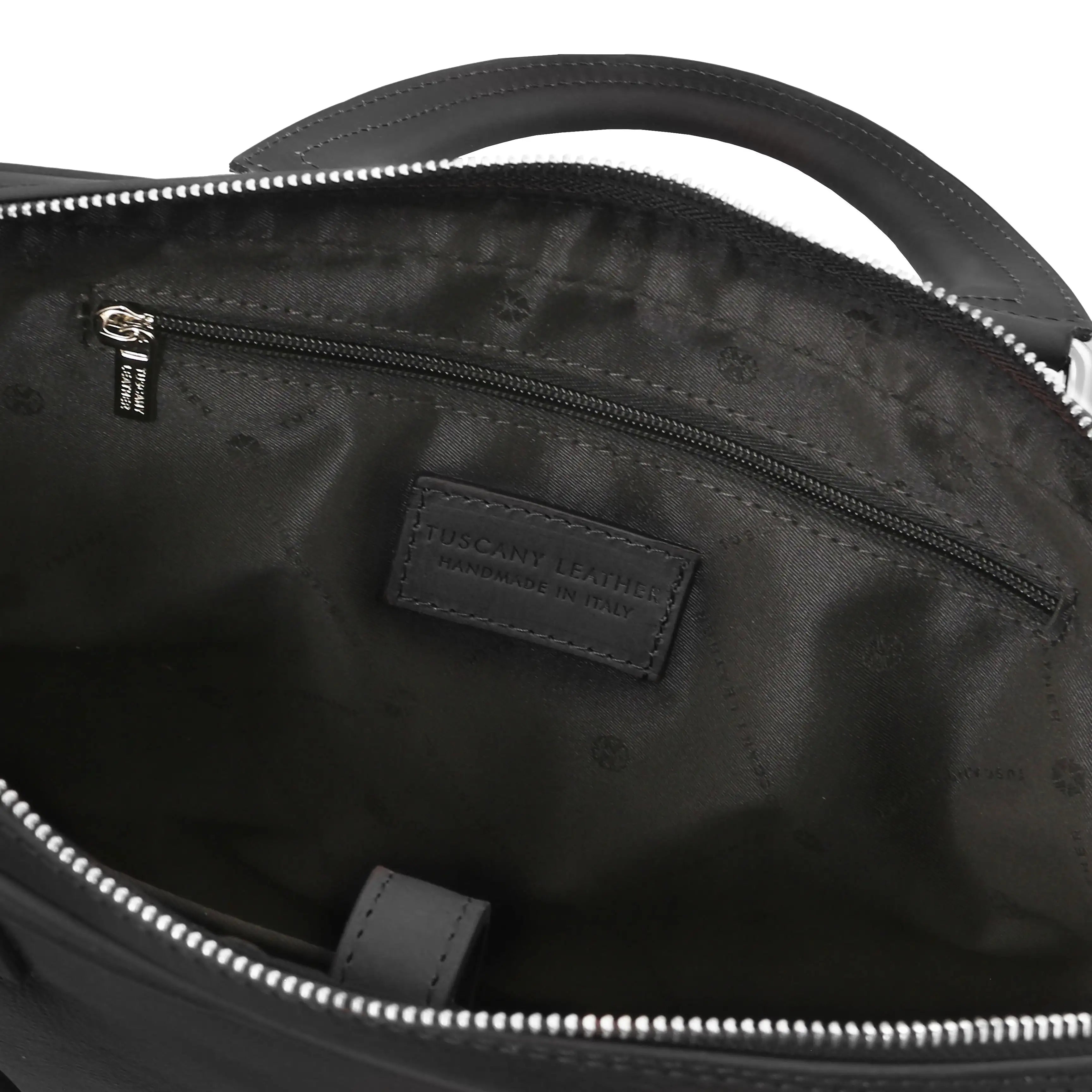 Black leather bag with a zip poclet and black lining on a white background