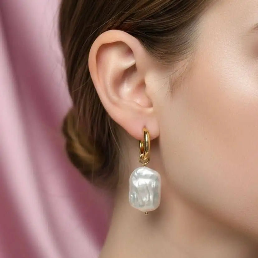 Close up view of the Amalfi Aurora 2-in-1 Hoop Earrings on a woman.