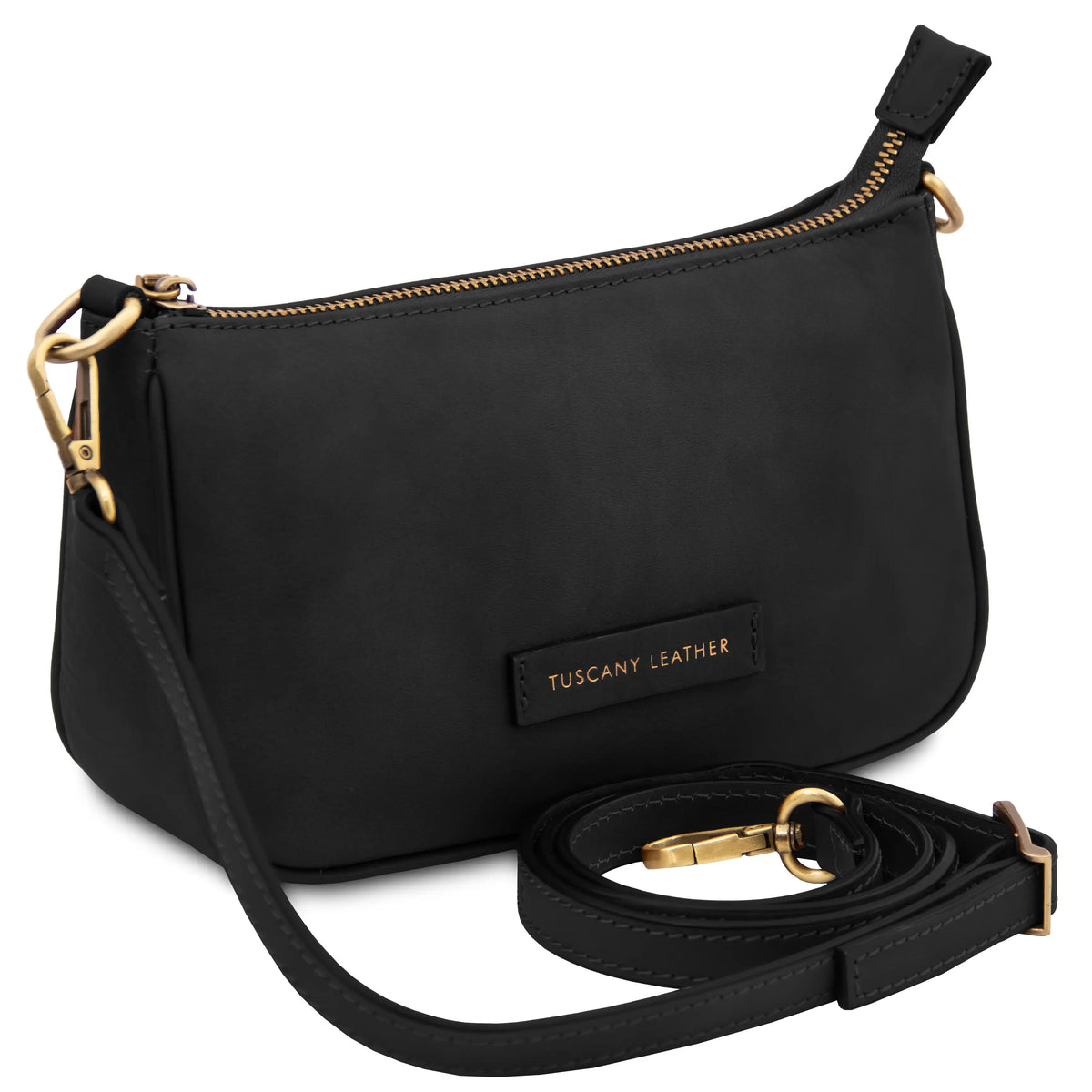 Black leather handbag with gold hardware and crossbody strap on a white background