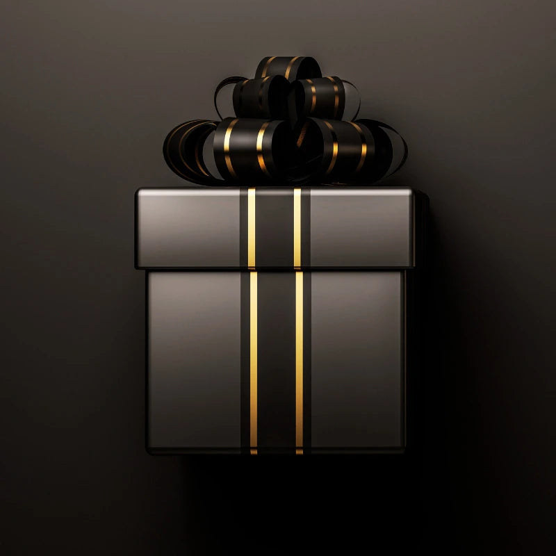 A black gift box with a gold and black ribbon and bow on a black background