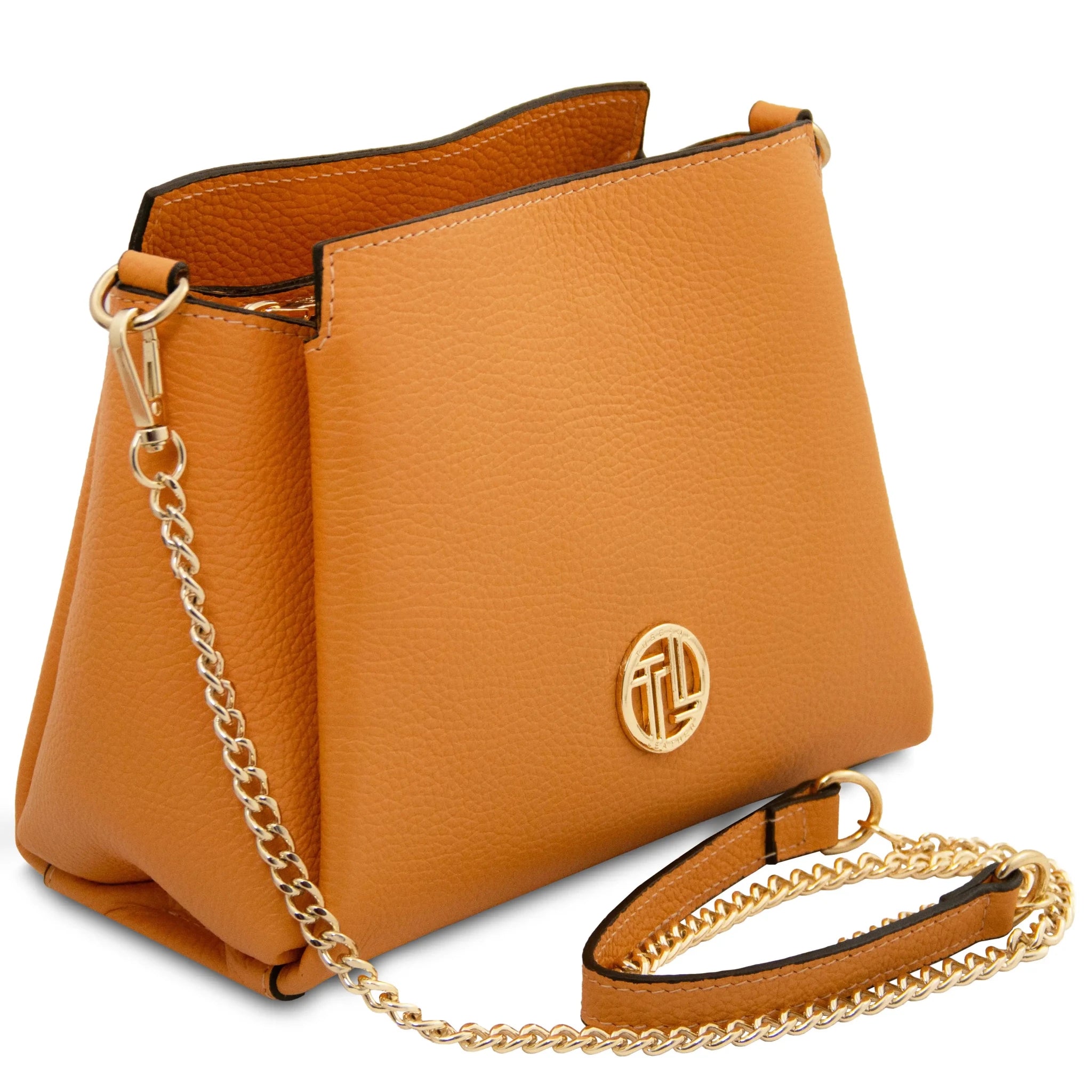 Front angled view Abby Pebbled Leather Bag in Apricot with crossbody strap