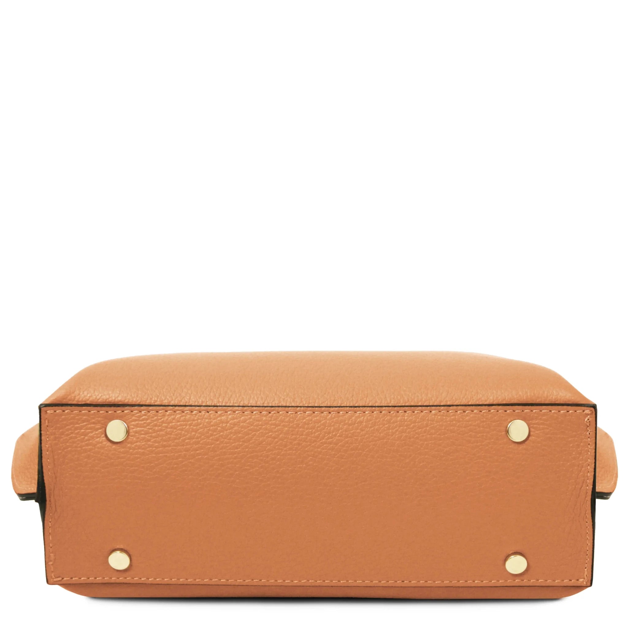 Bottom view of Apricot leather bag with gold protective feet on a white background