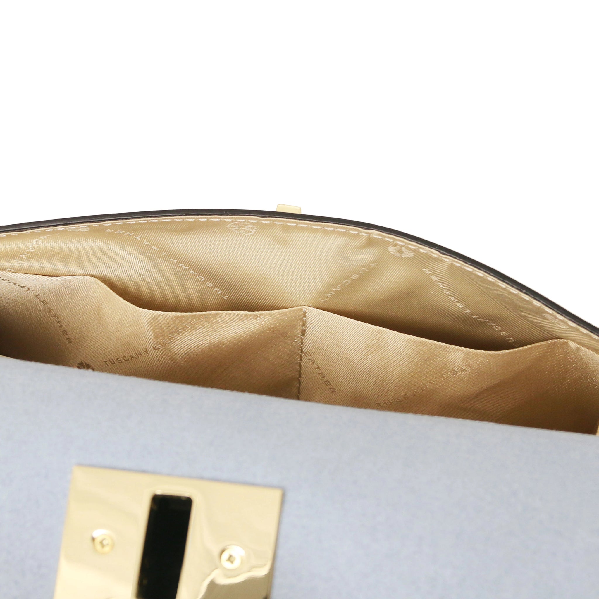 Interior open pockets view of Armonia Leather Handbag in Light Blue