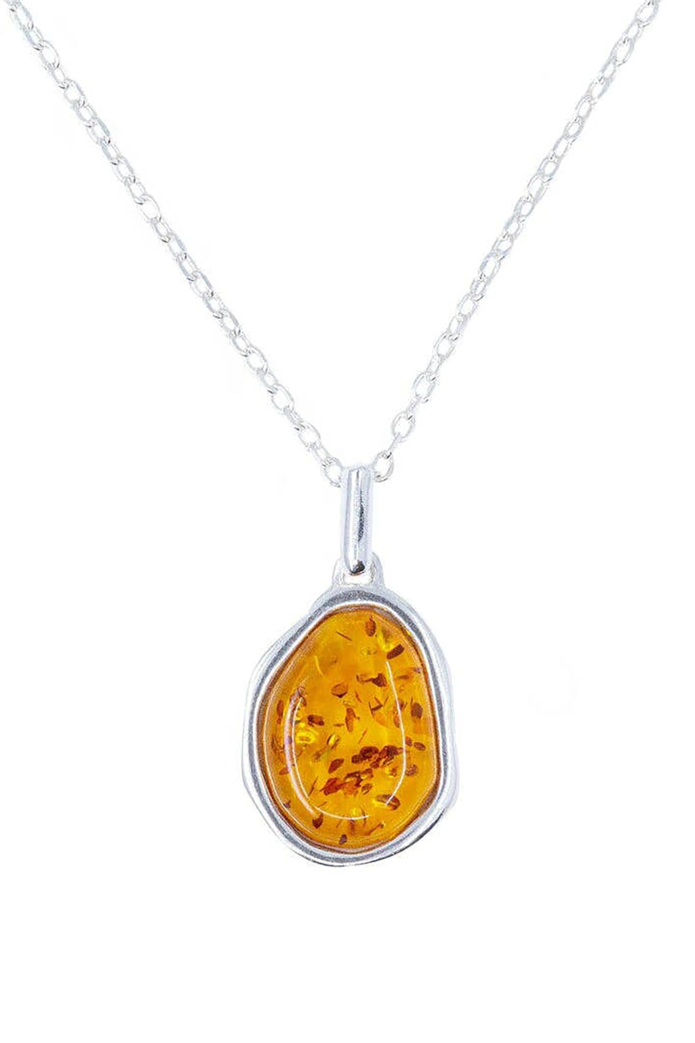 Baltic Honey Amber Element Silver Pendant Necklace hanging on a white background