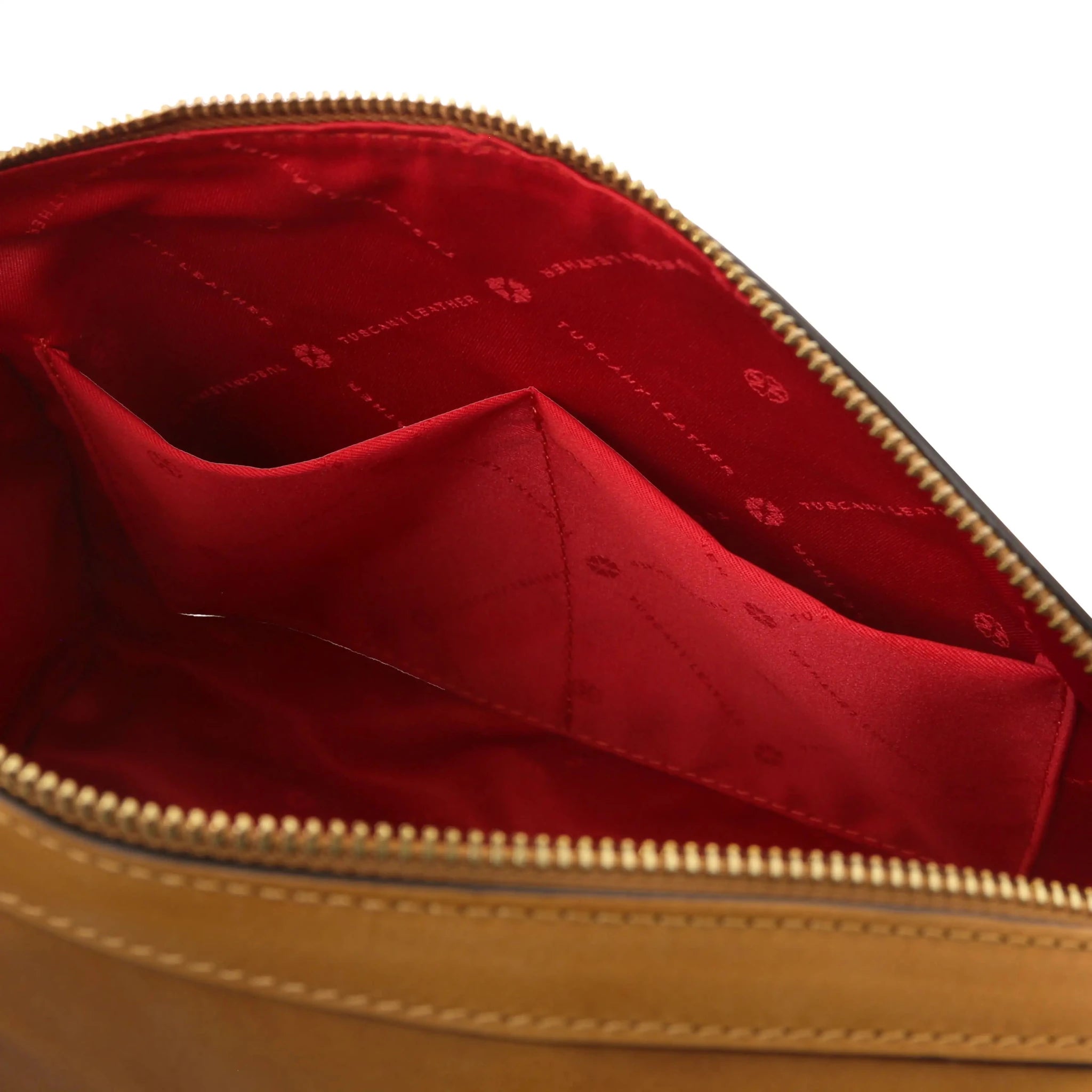 Interior open pockets view Barrique Leather bag in natural with red lining