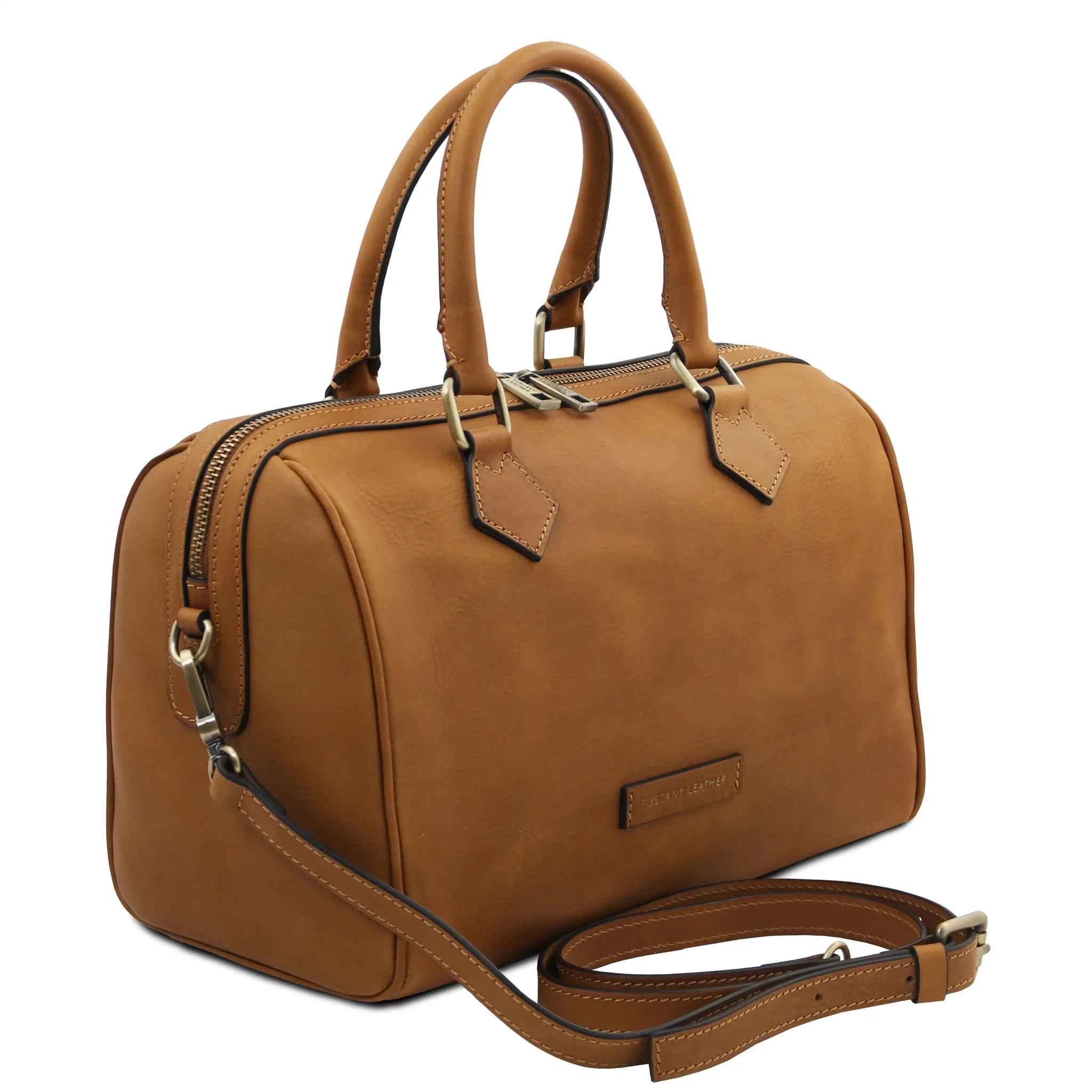 Front side angled View Barrique Leather Duffle bag in natural with shoulder strap