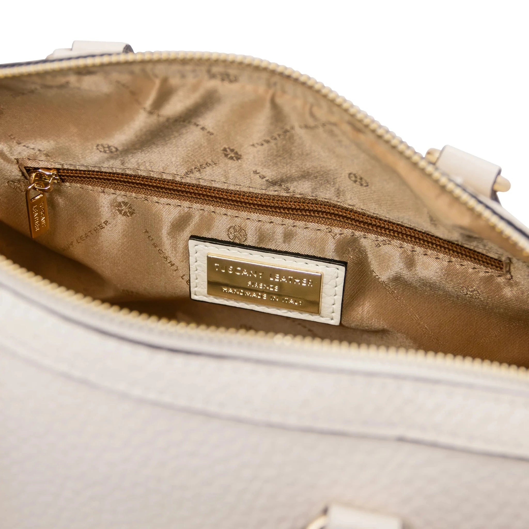Interior zip pockets view Barrique Leather bag in beige with tan lining
