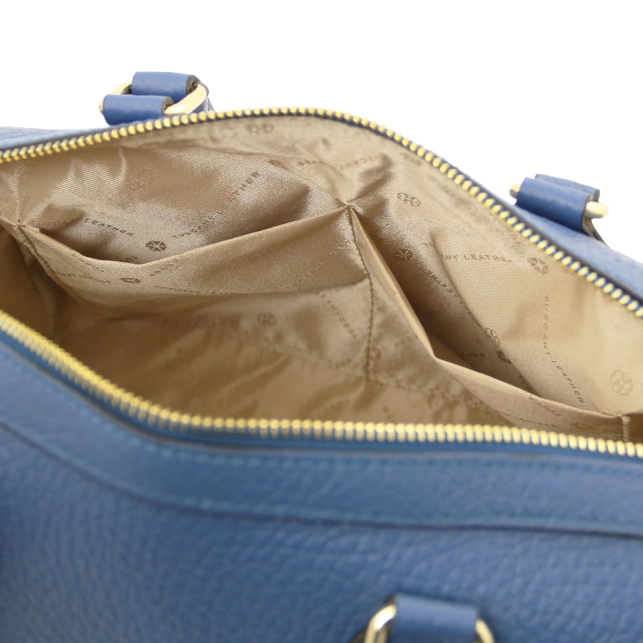 Interior open pockets view Barrique Leather bag in blue with beige lining