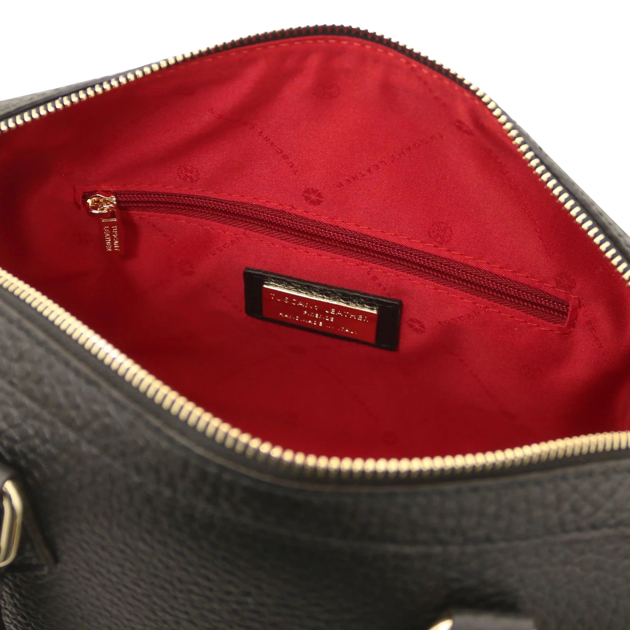 Interior zip pockets view Barrique Leather bag in black with red lining.webp