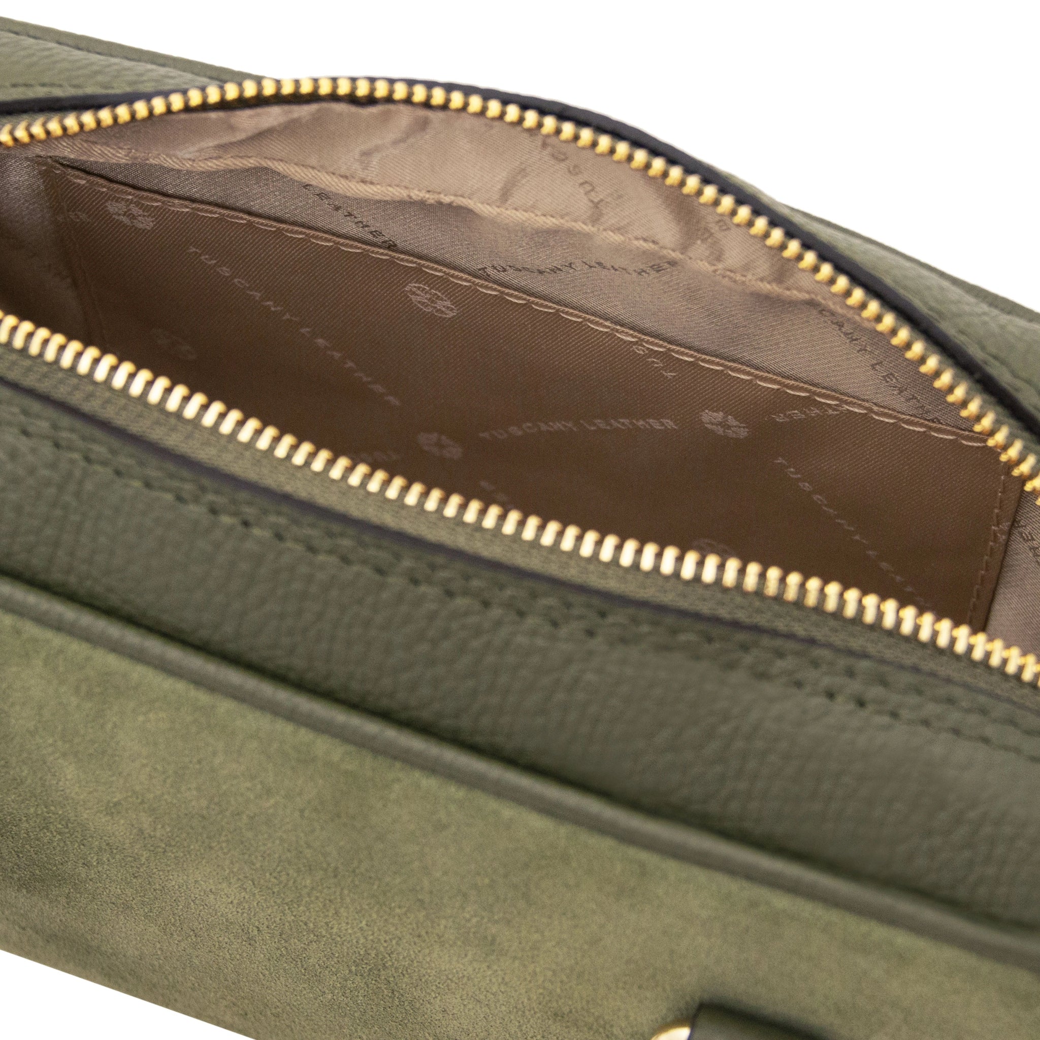 Interior view of Chantilly Suede Handbag in green with beige lining and open pocket