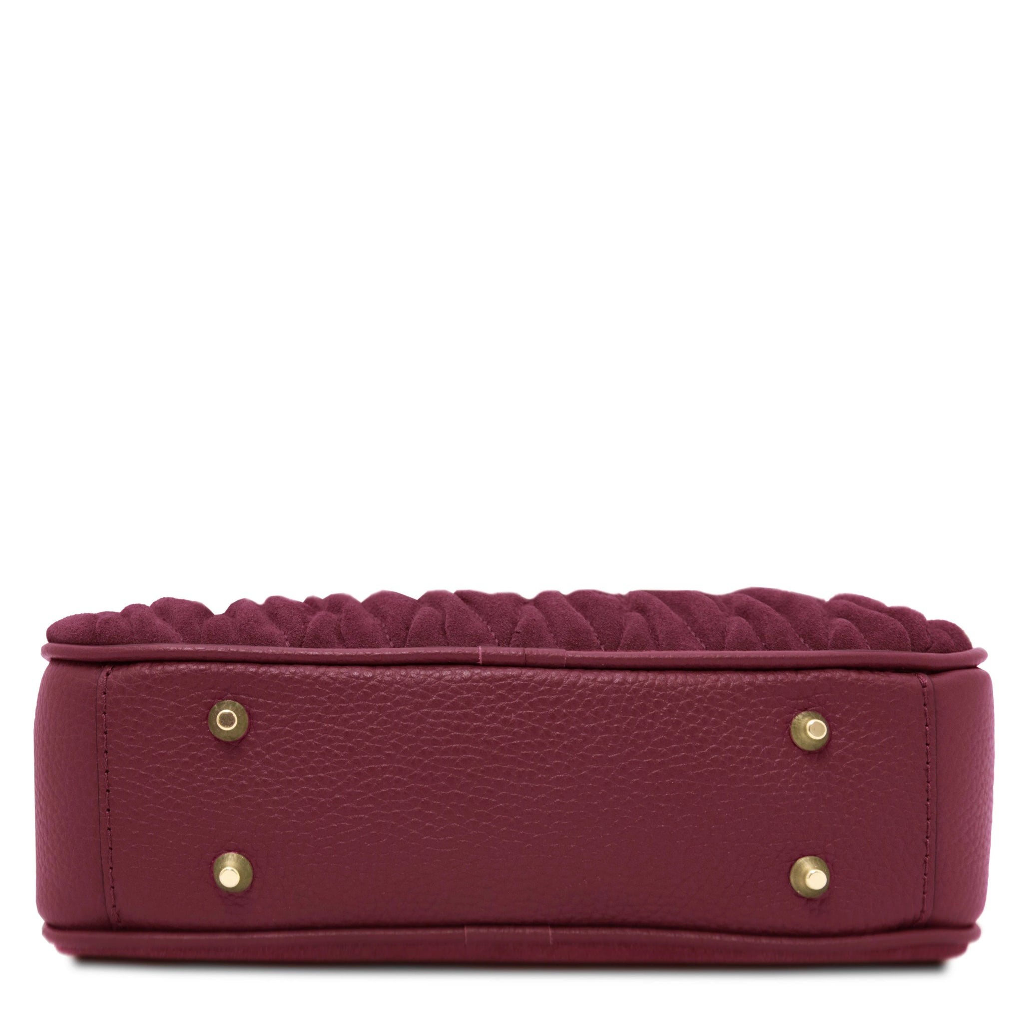 Bottom of bordeaux Chantilly Suede Handbag showing four gold feet