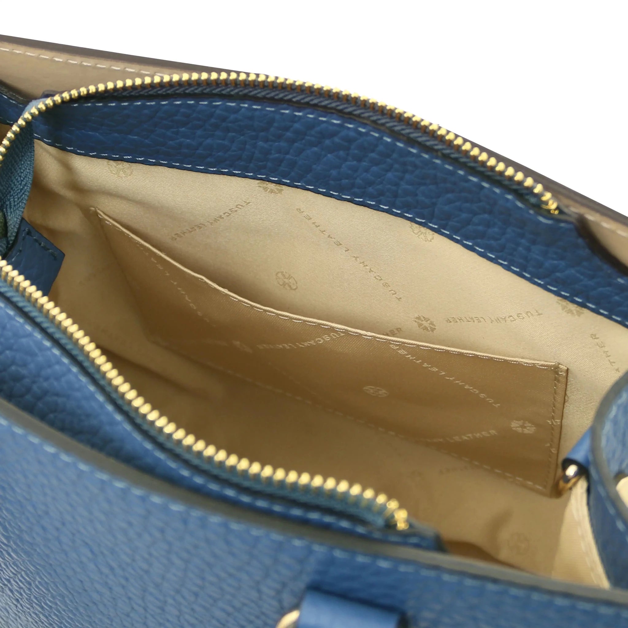 Interior open pocket view with beige lining Croque Italian Pebbled Leather Handbag in denim