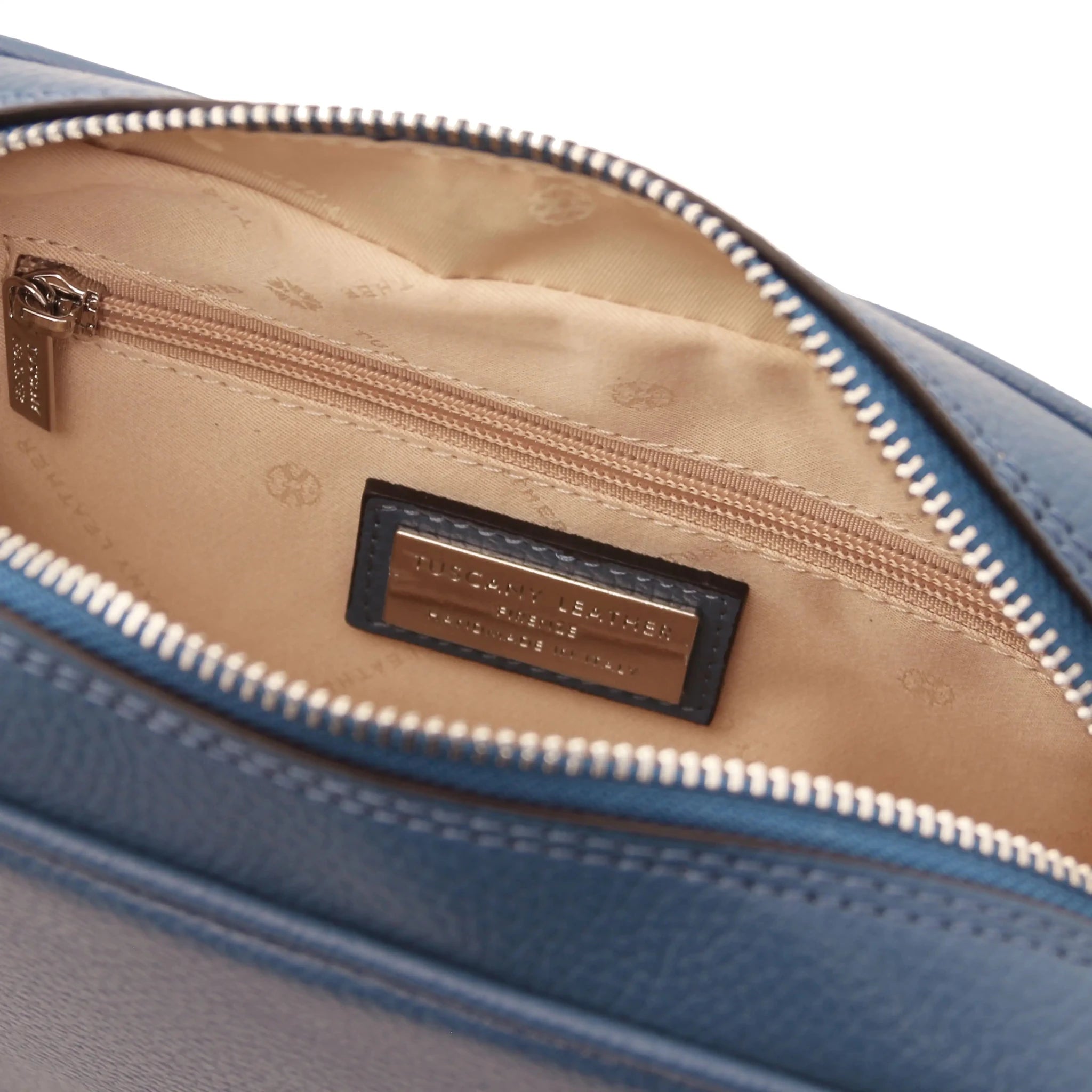 Interior zip pockets view denim Cubetto Leather Shoulder Bag with beige interior
