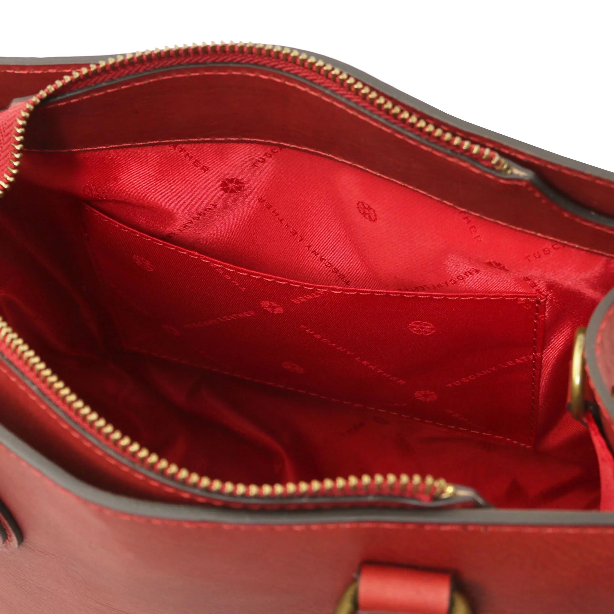 Interior open pocket red lining view Dama Textured Italian Leather Handbag in red