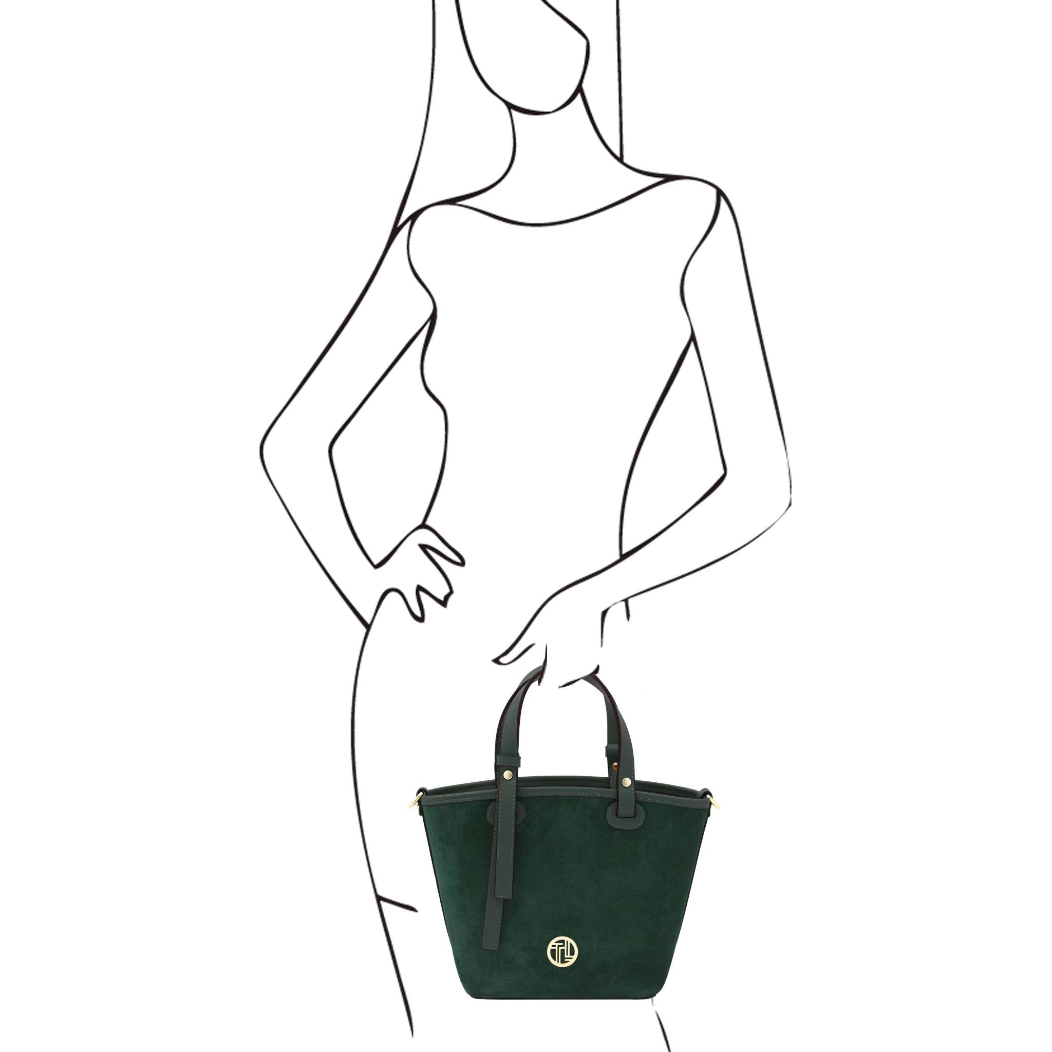 Black and white sketch of a woman holding Glacette Suede Bucket bag in Forest Green