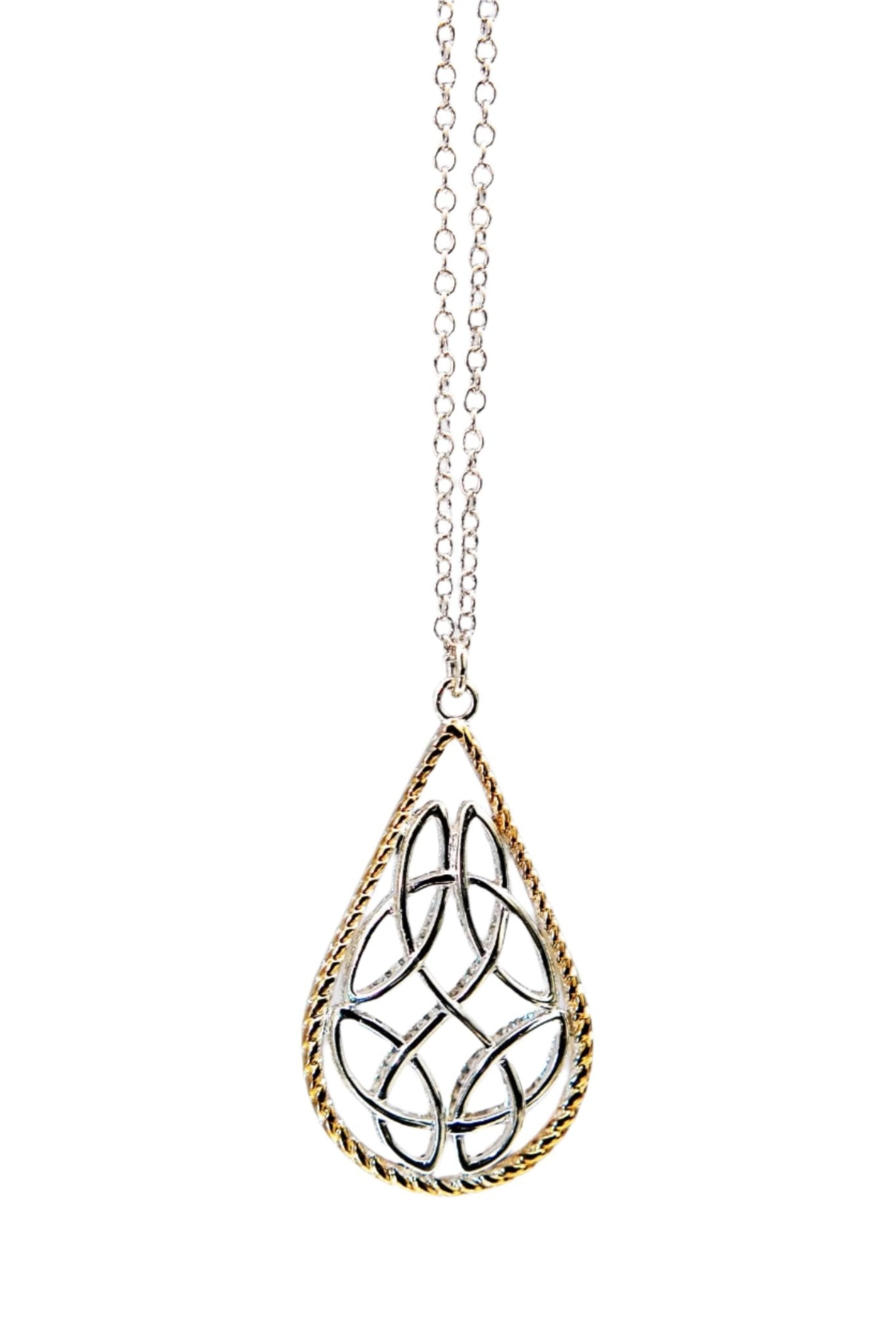 Irish Trinity Reversible Pendant Necklace gold side on a white background - L'Atelier Global