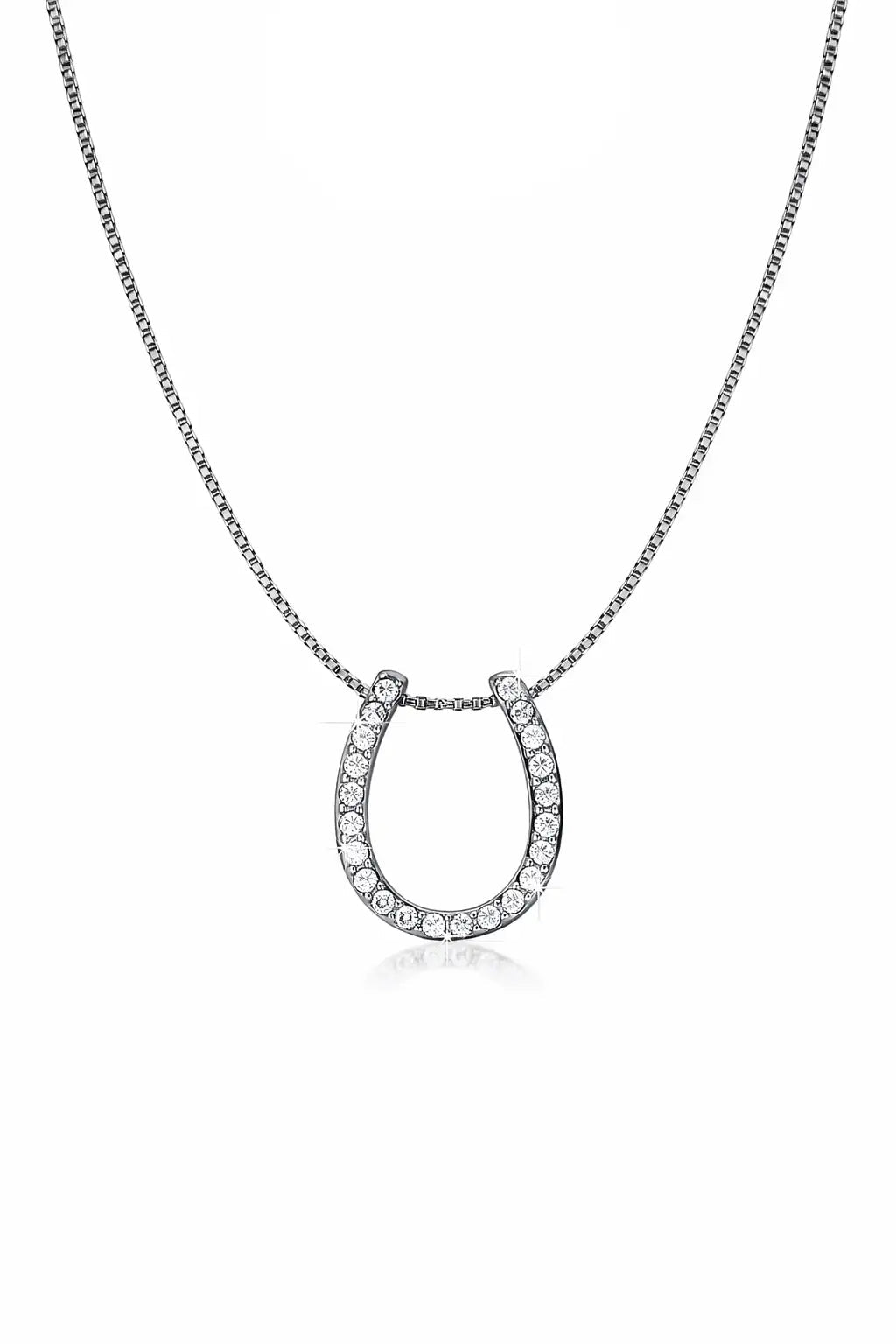 Silver horseshoe necklace with clear stones on a white background