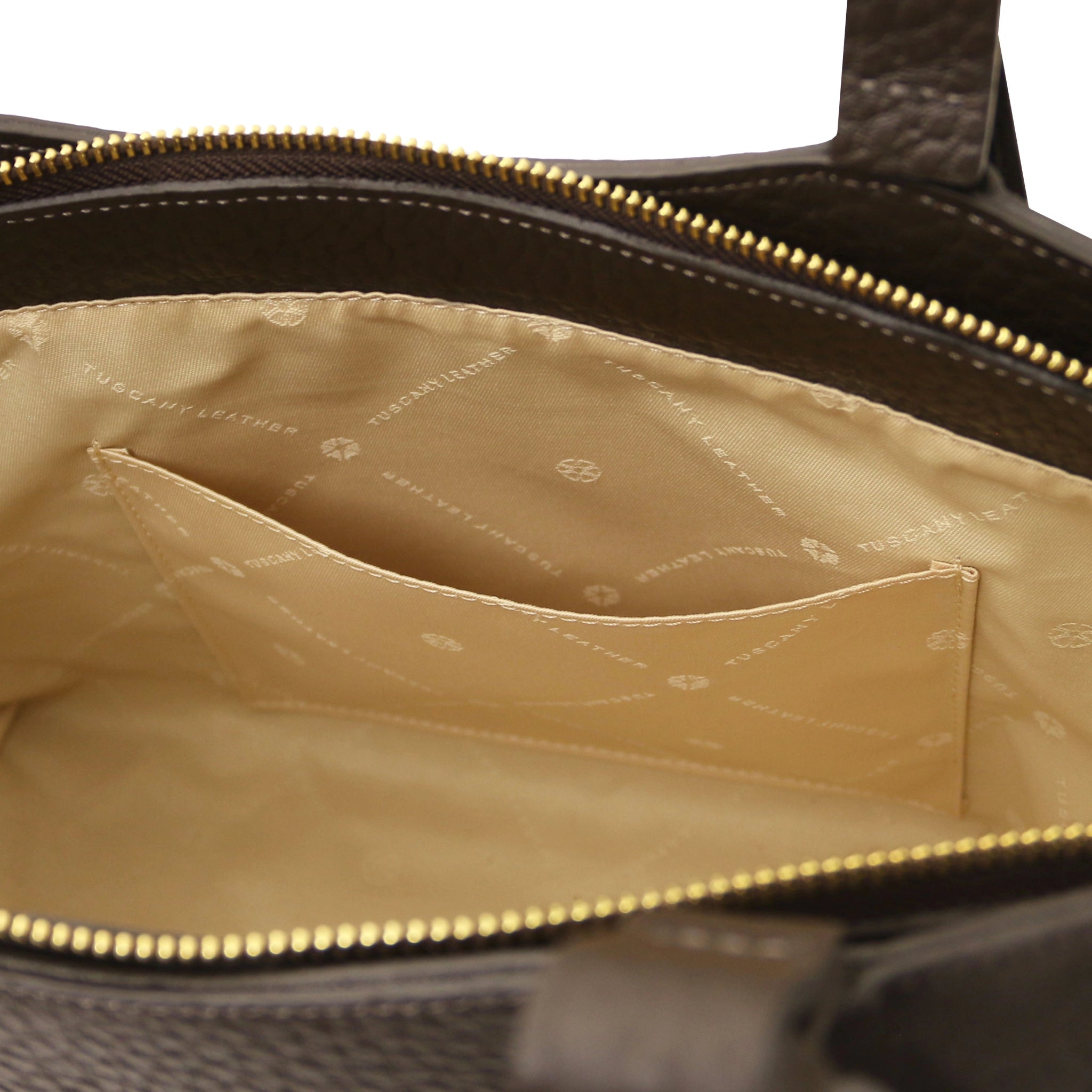 Interior of the Libra Leather Suede Shoulder Bag in dark brown with beige lining and a slip pocket.