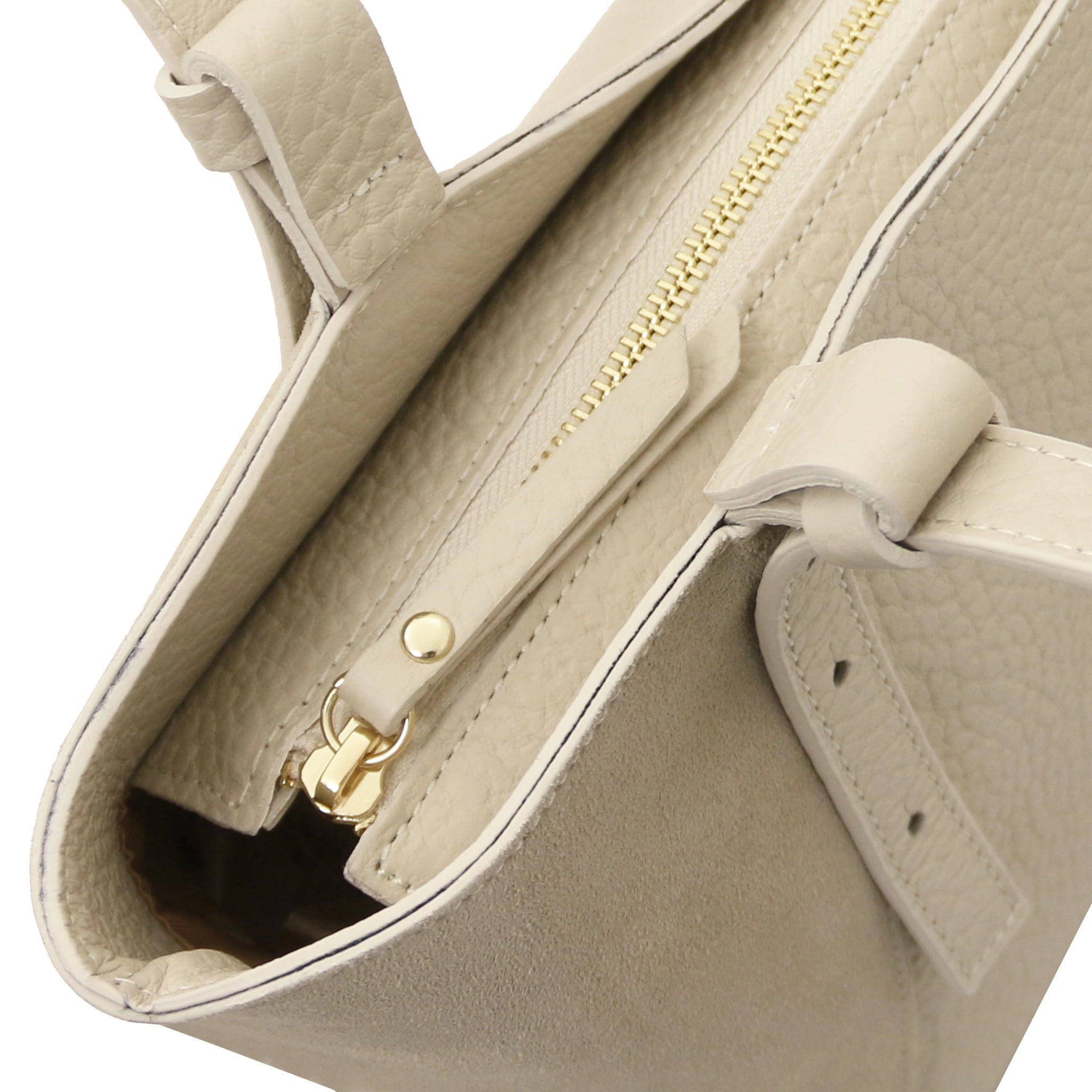 Top view of the Libra Leather Suede Shoulder Bag in beige showing gold zipper and strap detail.