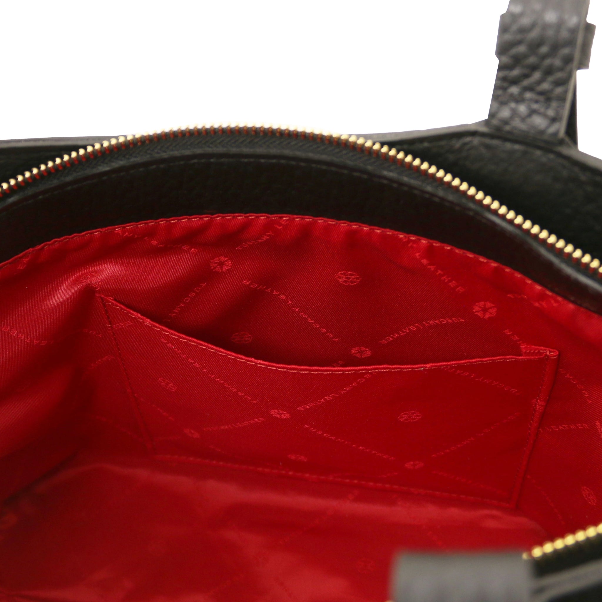 Interior of the Libra Leather Suede Shoulder Bag in black with red lining and a slip pocket