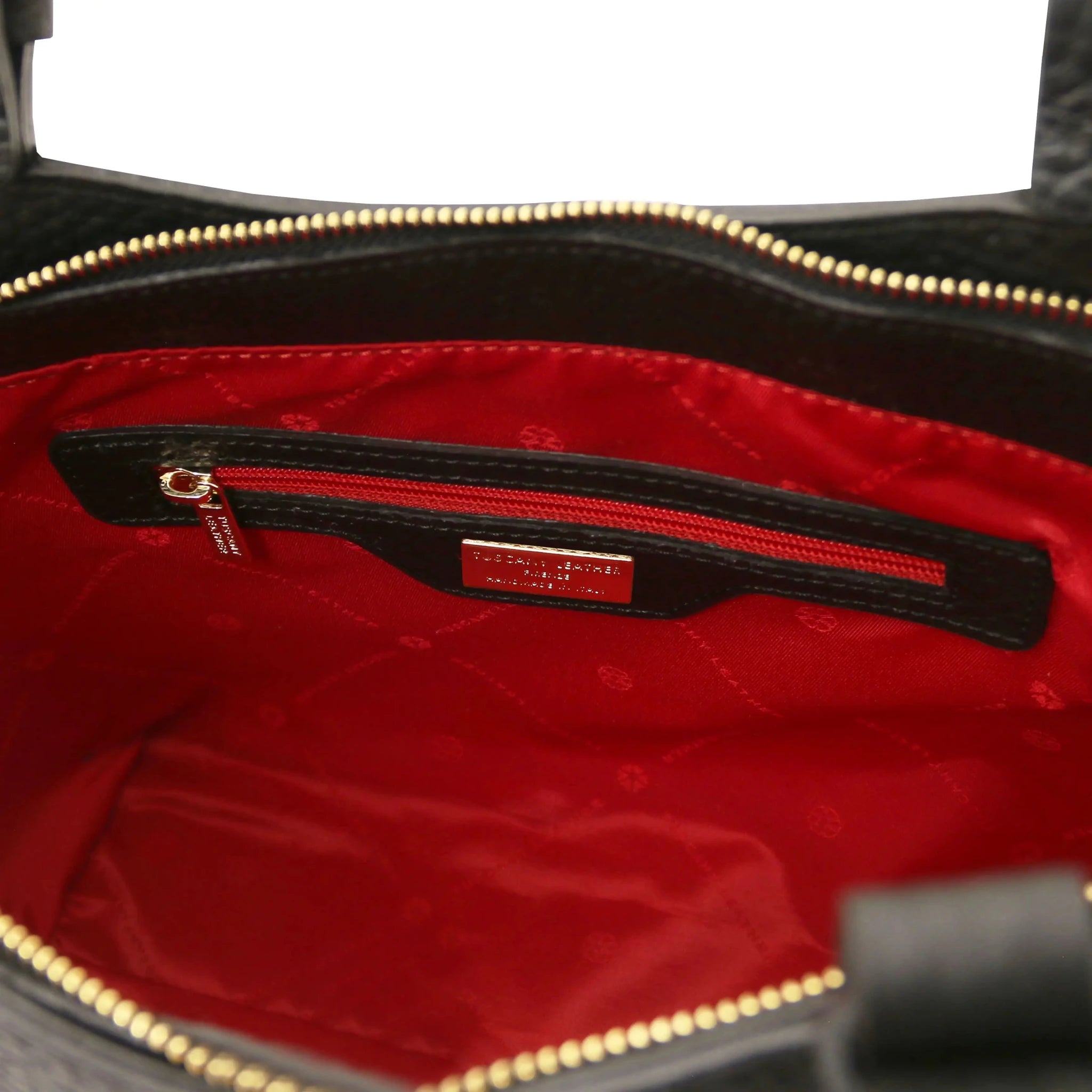 Interior zip pocket view Libra Leather Shoulder Bag in black with red lining