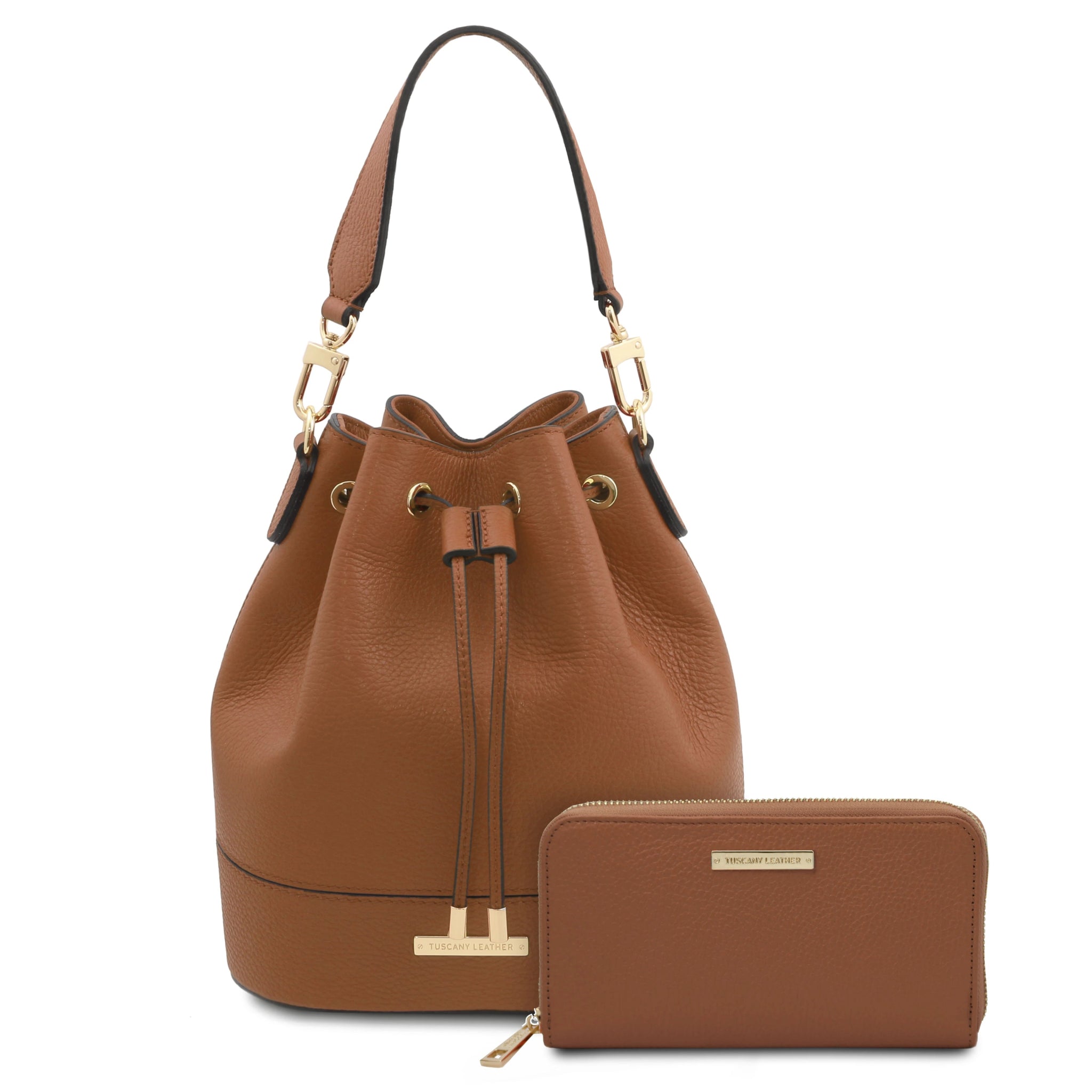 Front view TL Italian Leather Bucket Bag in cognac showing drawstring and handle with gold hardware and Eris wallet in cognac