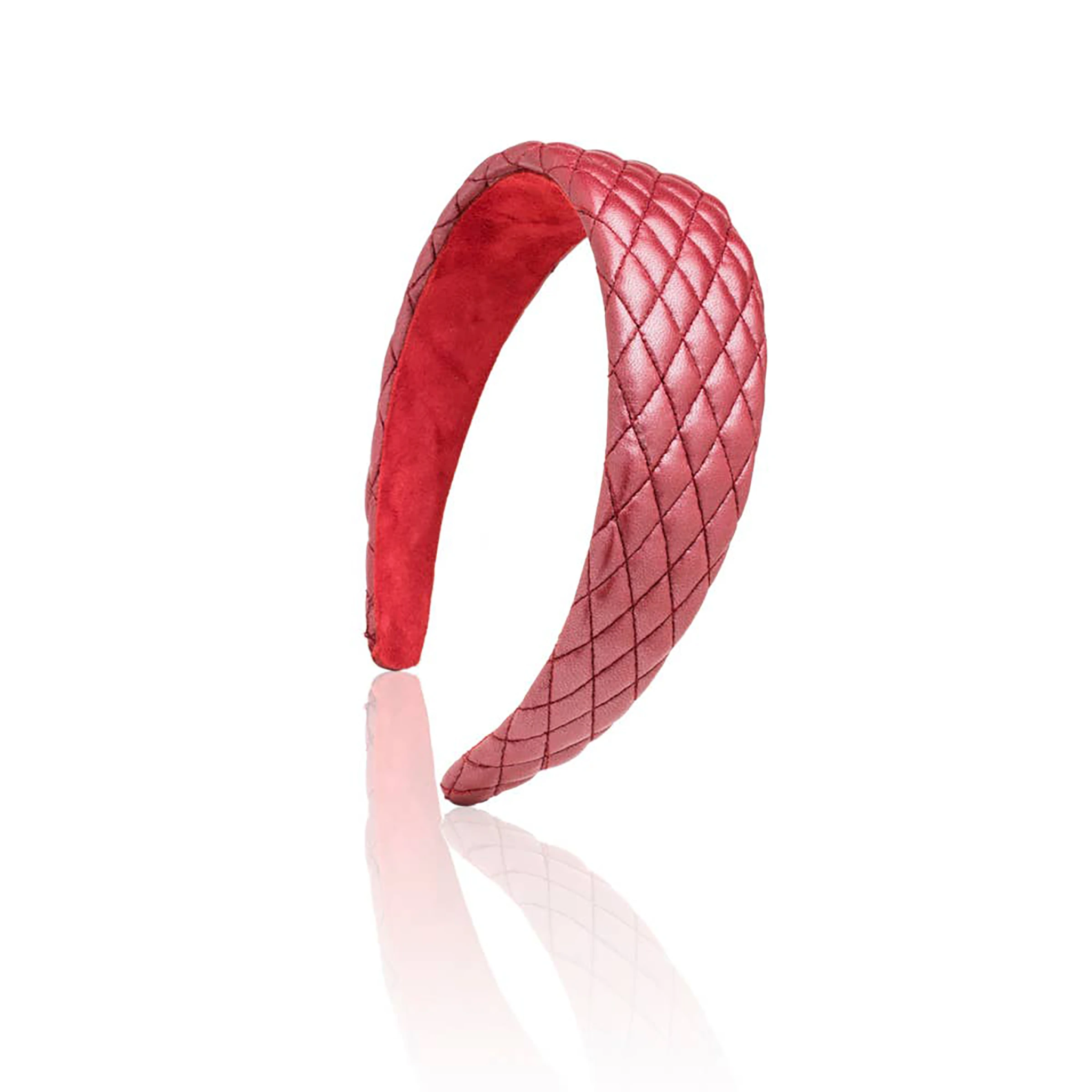 Red quilted leather headband on a white background