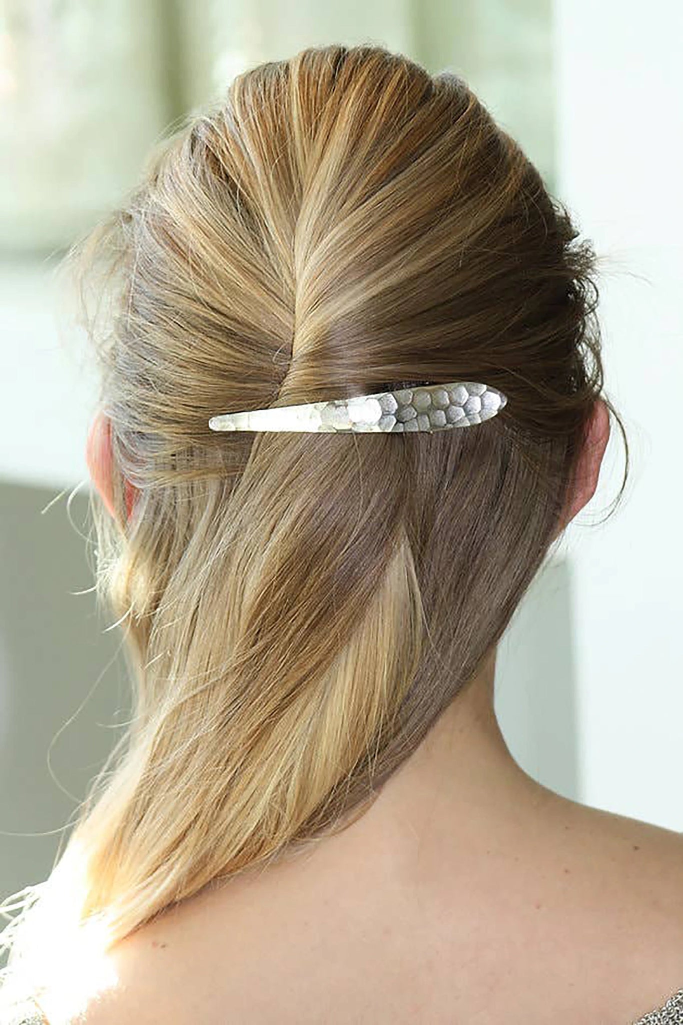 Hammered Silver Hair Clip on a blonde hair woman's twisted hair