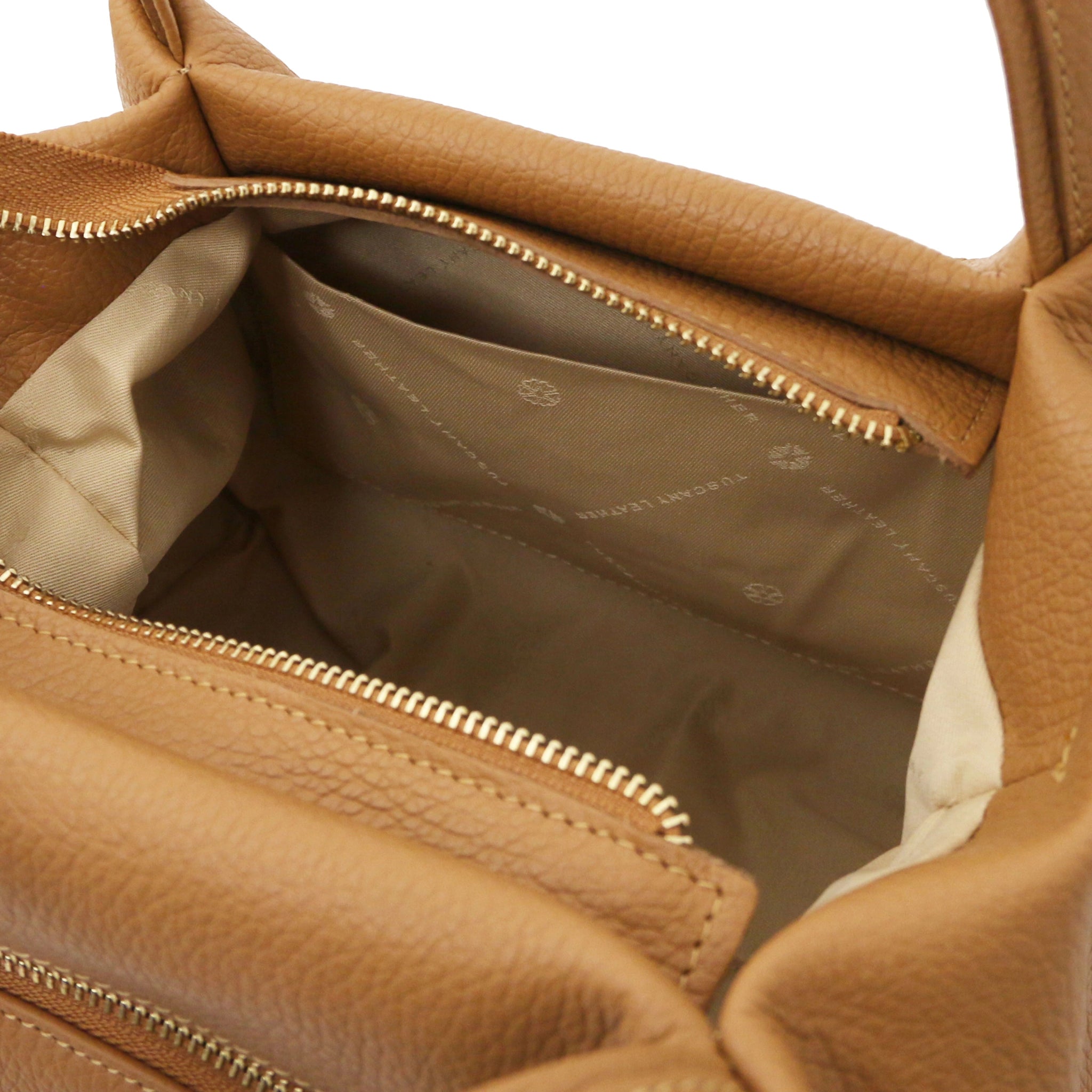 Interior open pocket view Nora Soft Italian Leather Shoulder Bag in Caramel showing main zippered closure