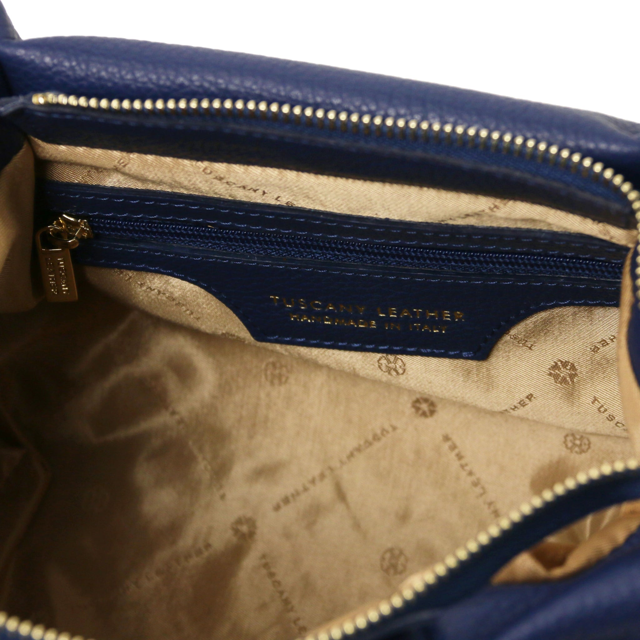 Interior zip pocket view Nora Soft Italian Leather Shoulder Bag in Dark Blue showing main zippered closure