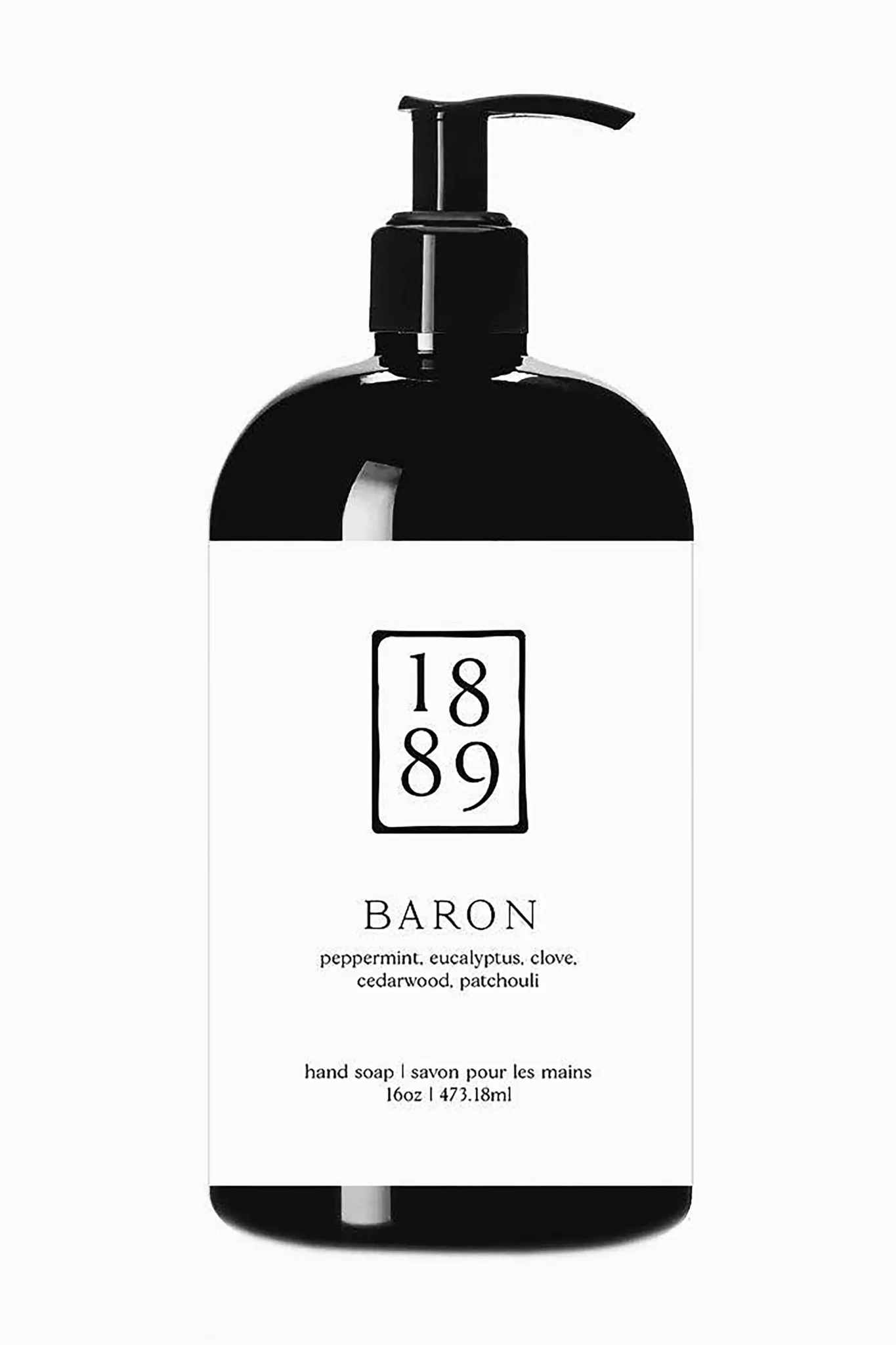 Black and white bottle of Baron hand cram with pump on a white background