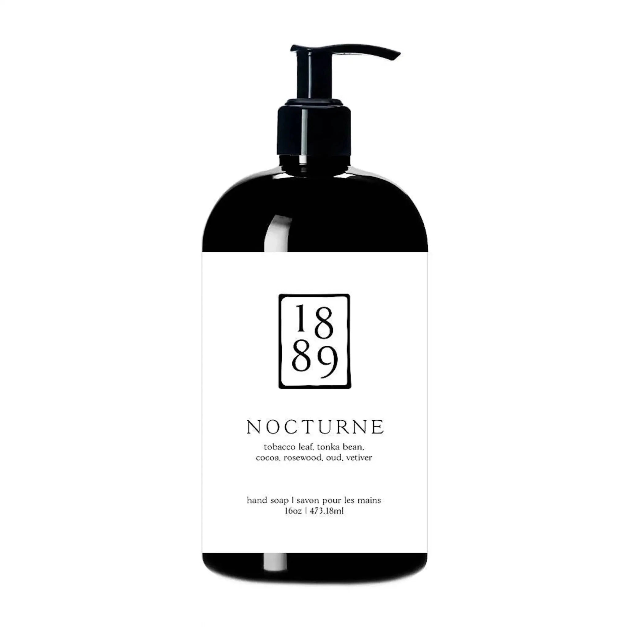 Bottle of soap with a pump and '1889 Nocturne' label on a white background