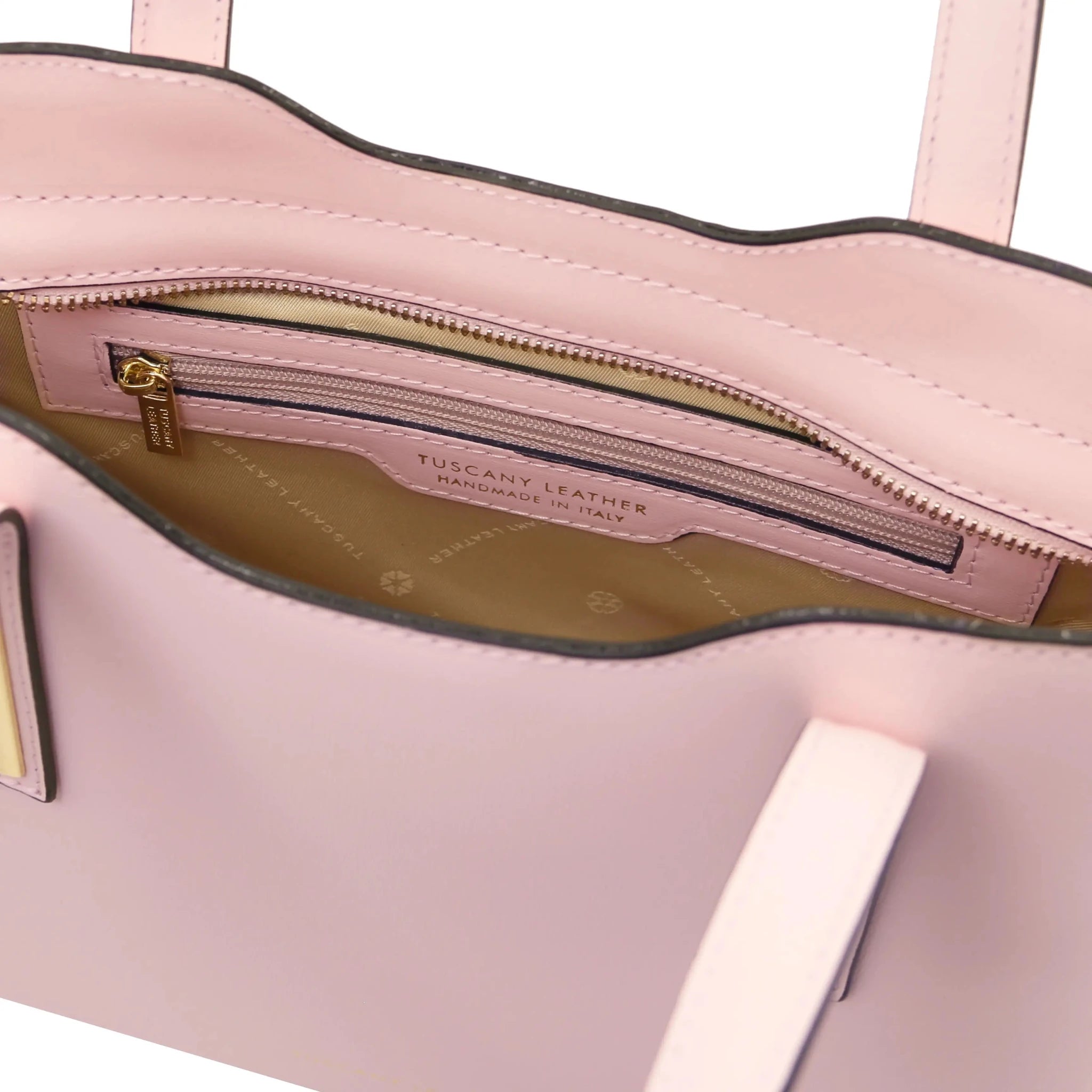 Interior Zip Pocket  View Olimpia Leather Tote in Ballet Pink Small Size showing beige lining