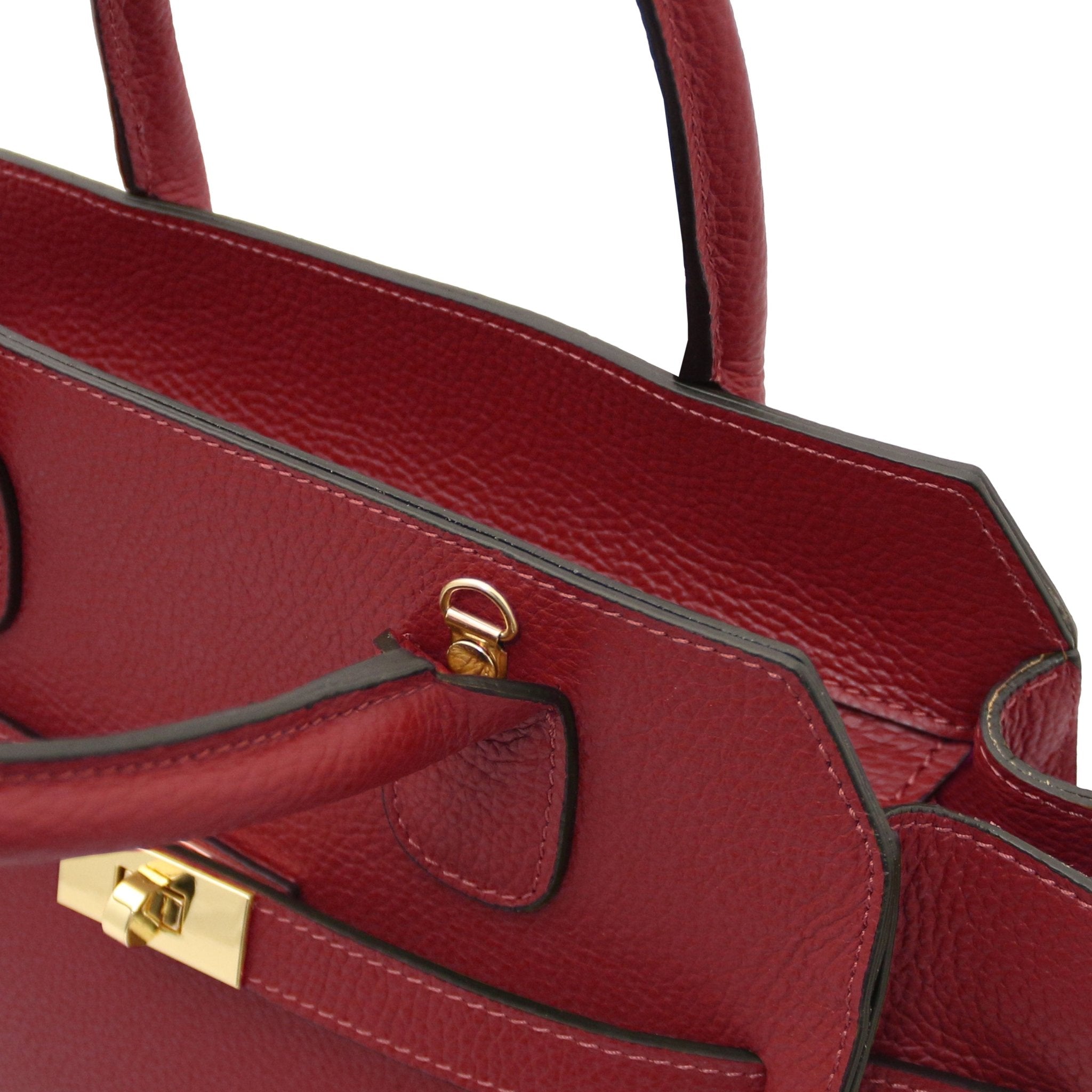Close up Origami Italian Pebbled red front gold twist lock andd handle