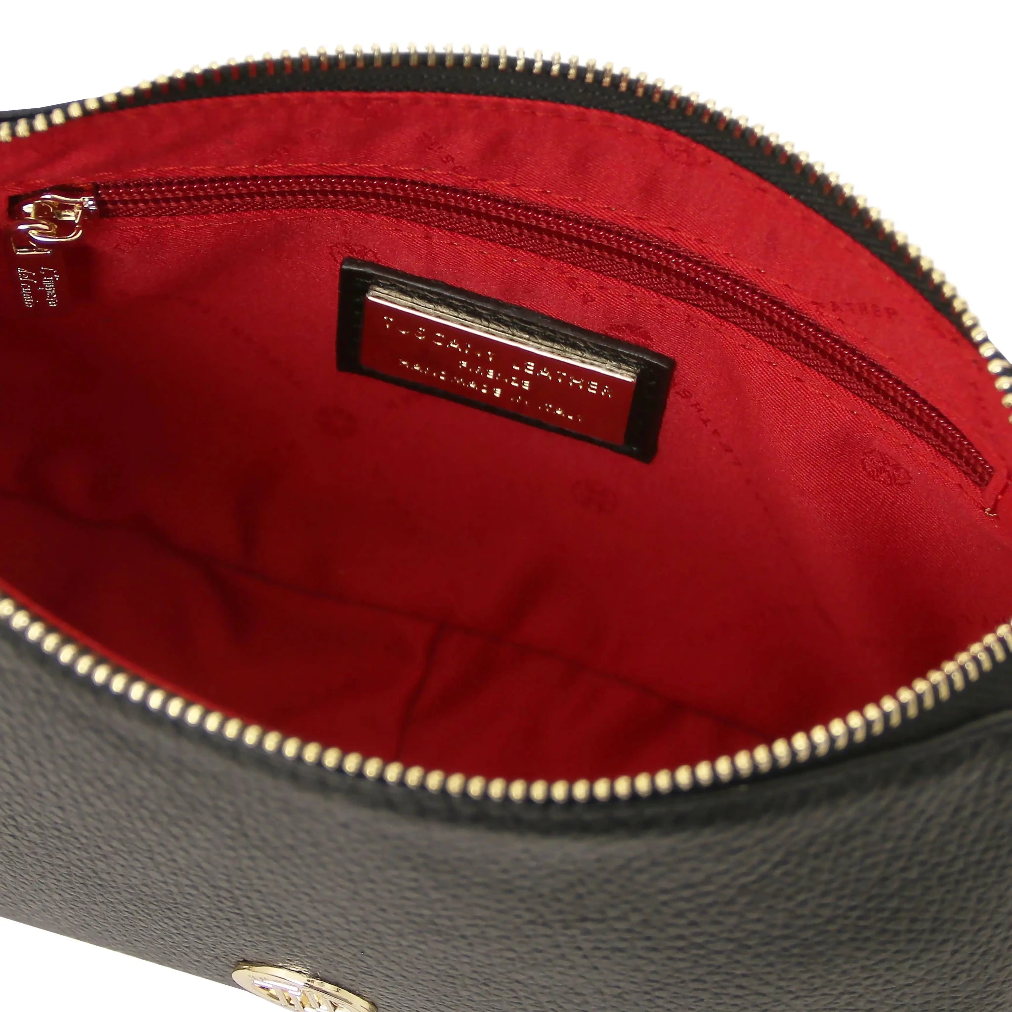Interior zip pocket view Parfait Leather Clutch in black with red lining on white background