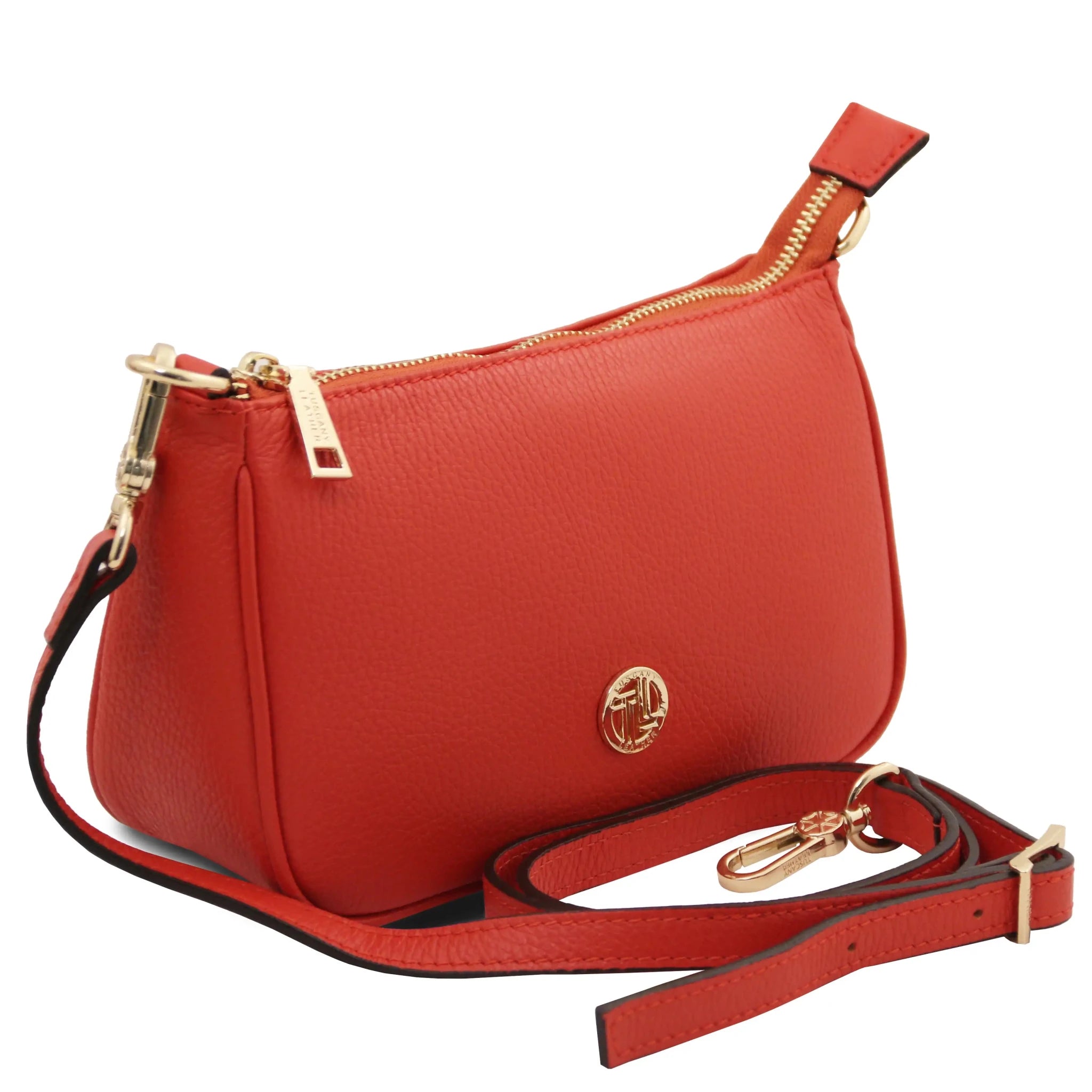 Front angled view Parfait Italian Pebbled Leather Clutch in coral with shoulder strap