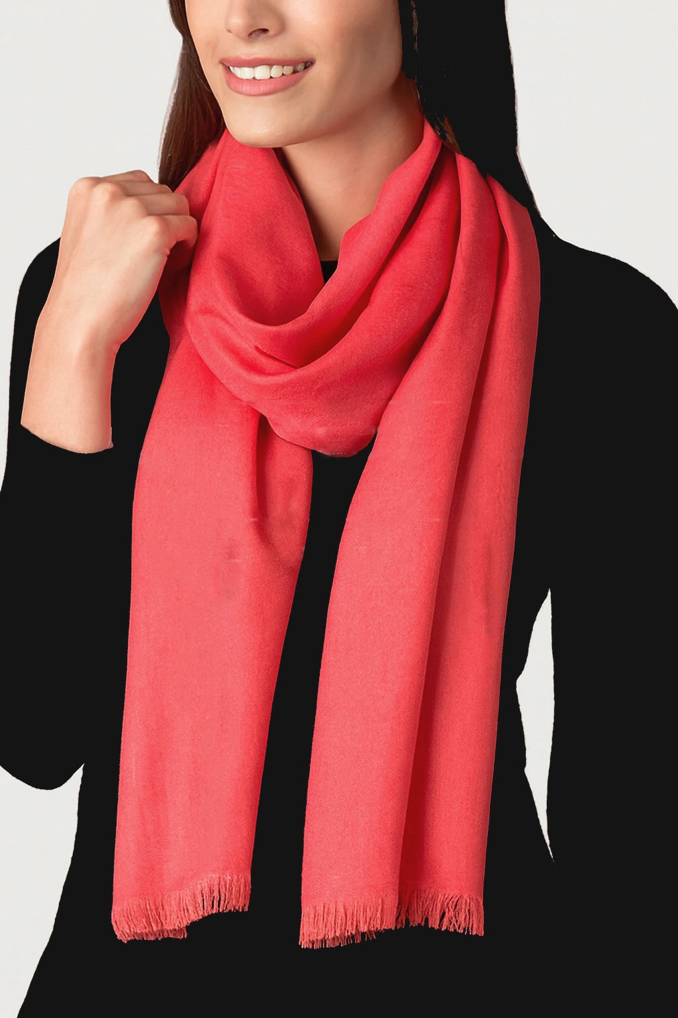 Coral Baby Alpaca Stole on a model wearing a black sweater