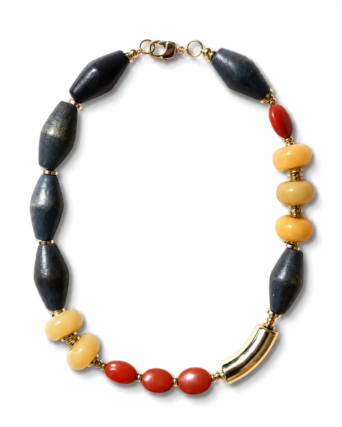Necklace with black, red, yellow, and gold beads on a white background