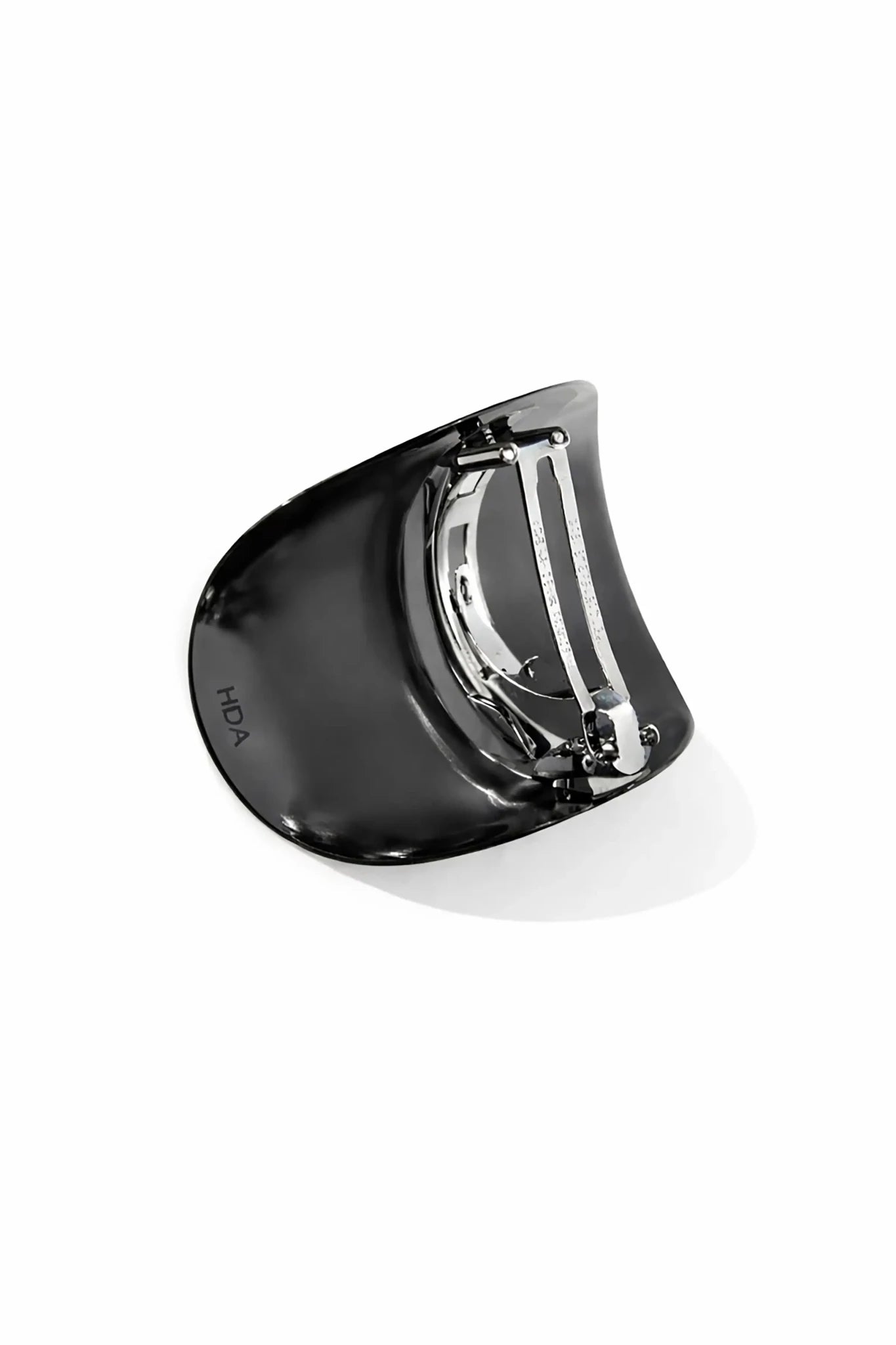 Back view Sculpted Arc Barrette Black Rhodium on a white background