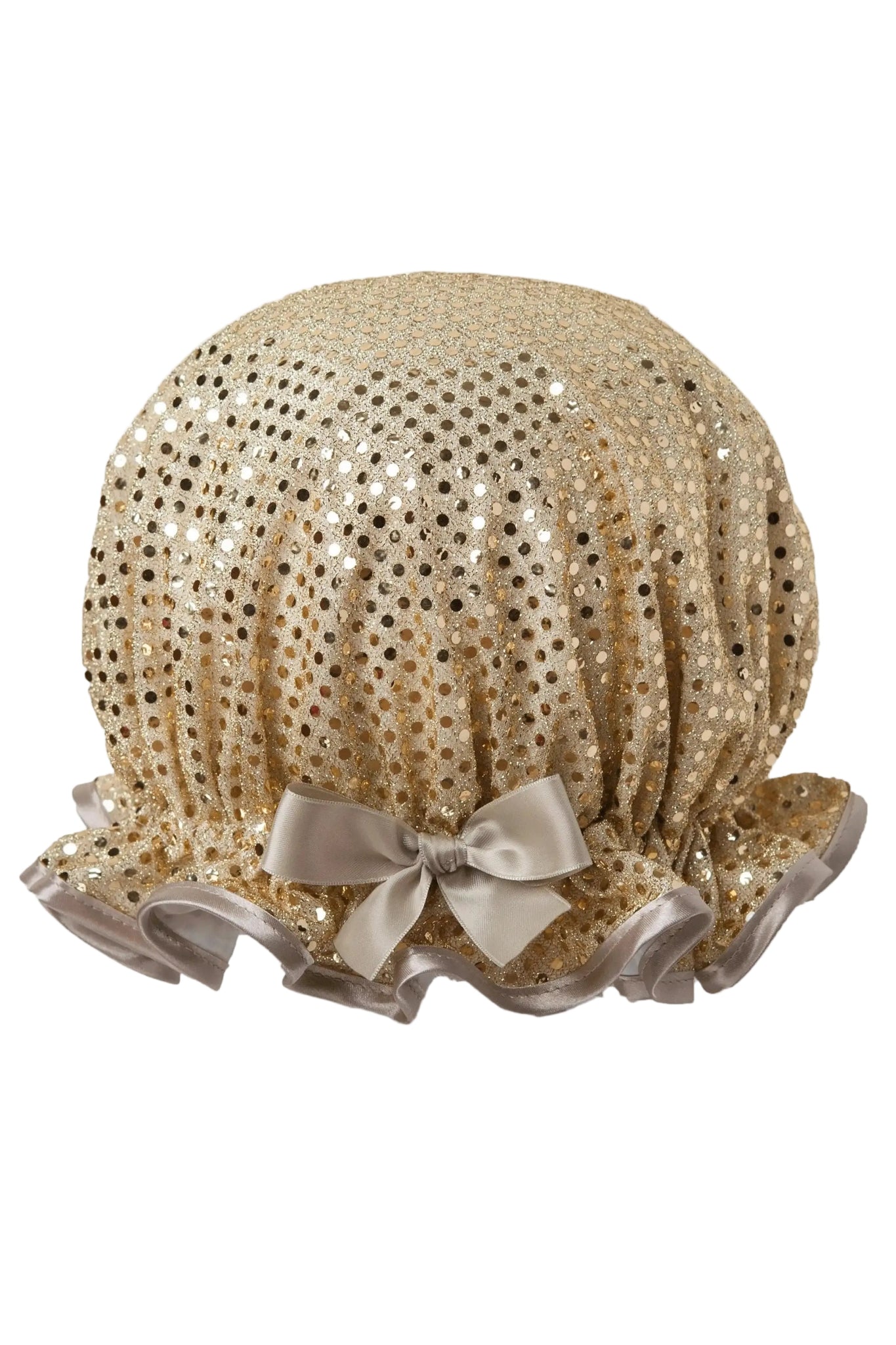 Gold sequin bonnet with a bow on a white background