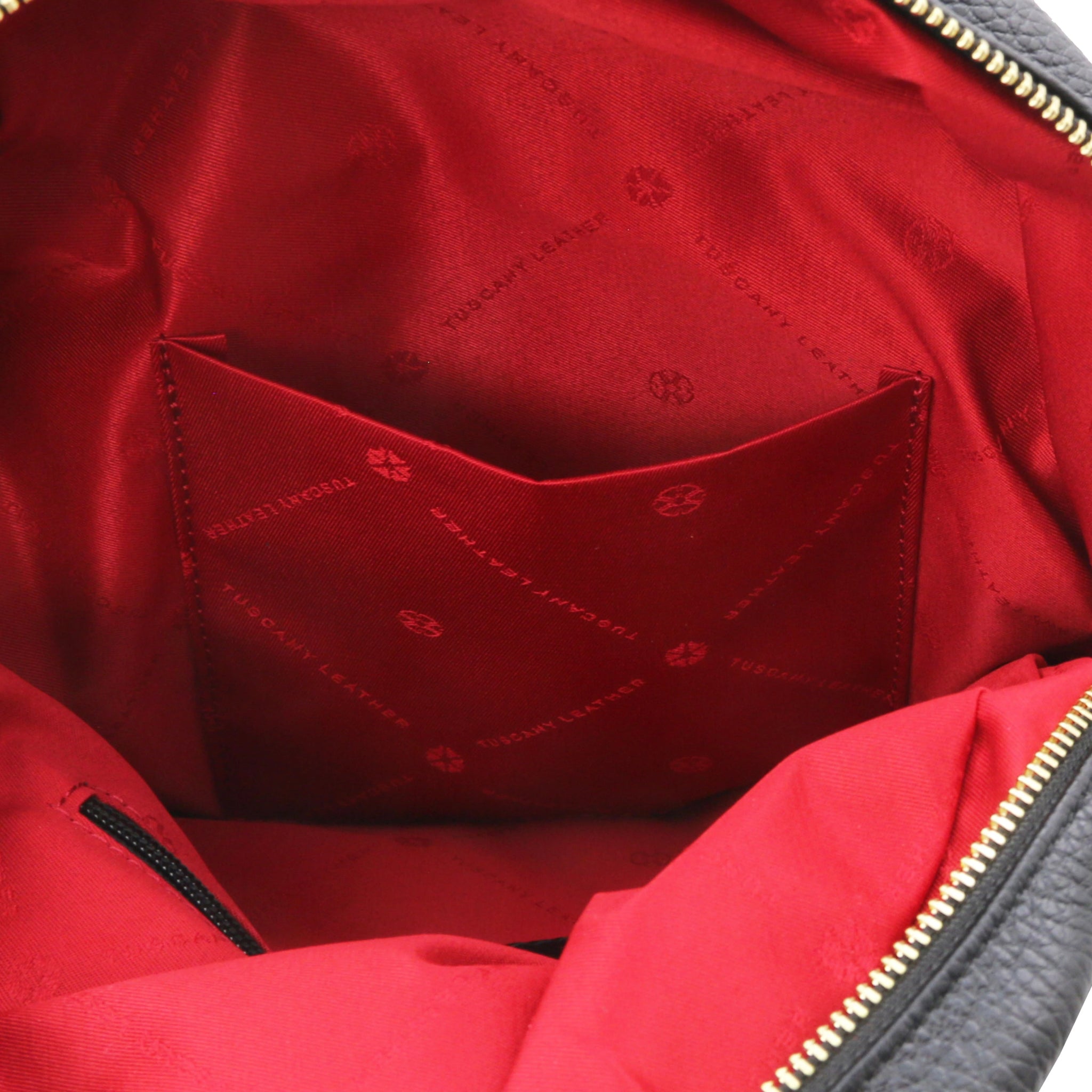 Interior open pocket view TL Bag Italian Soft Leather Zip Backpack in black showing vibrant red lining