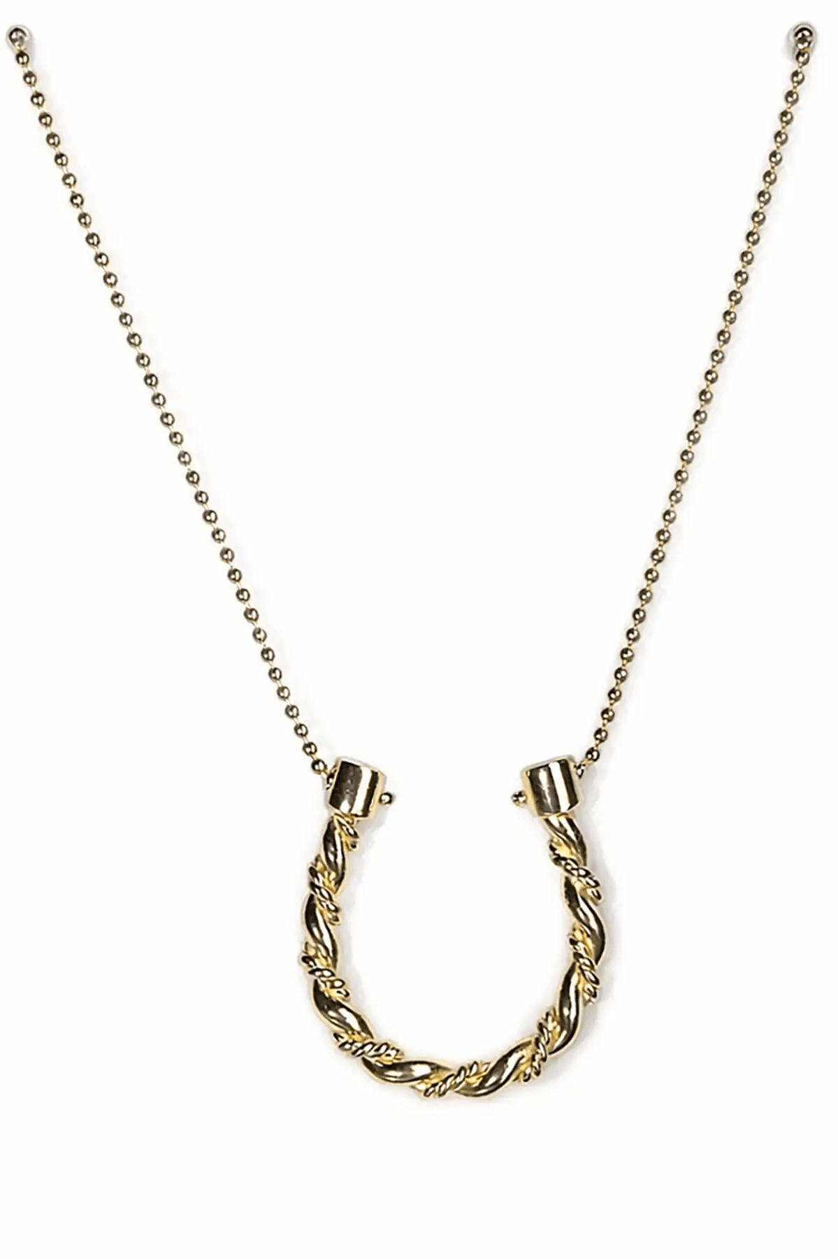 Gold necklace with a horse shoe design on a white background