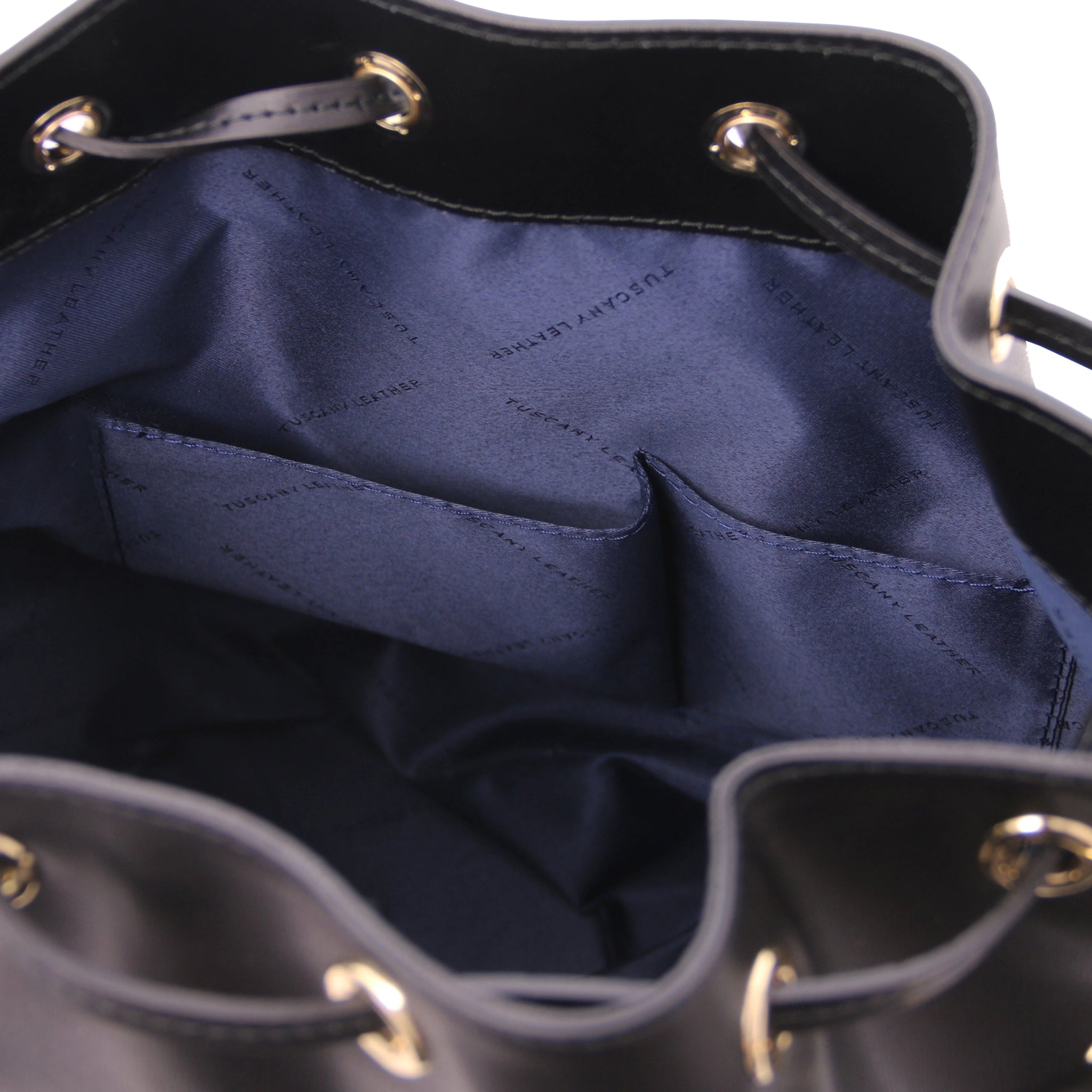 Interior open pocket view of Vittoria Leather Bucket Bag in black on a white background - L'Atelier Global